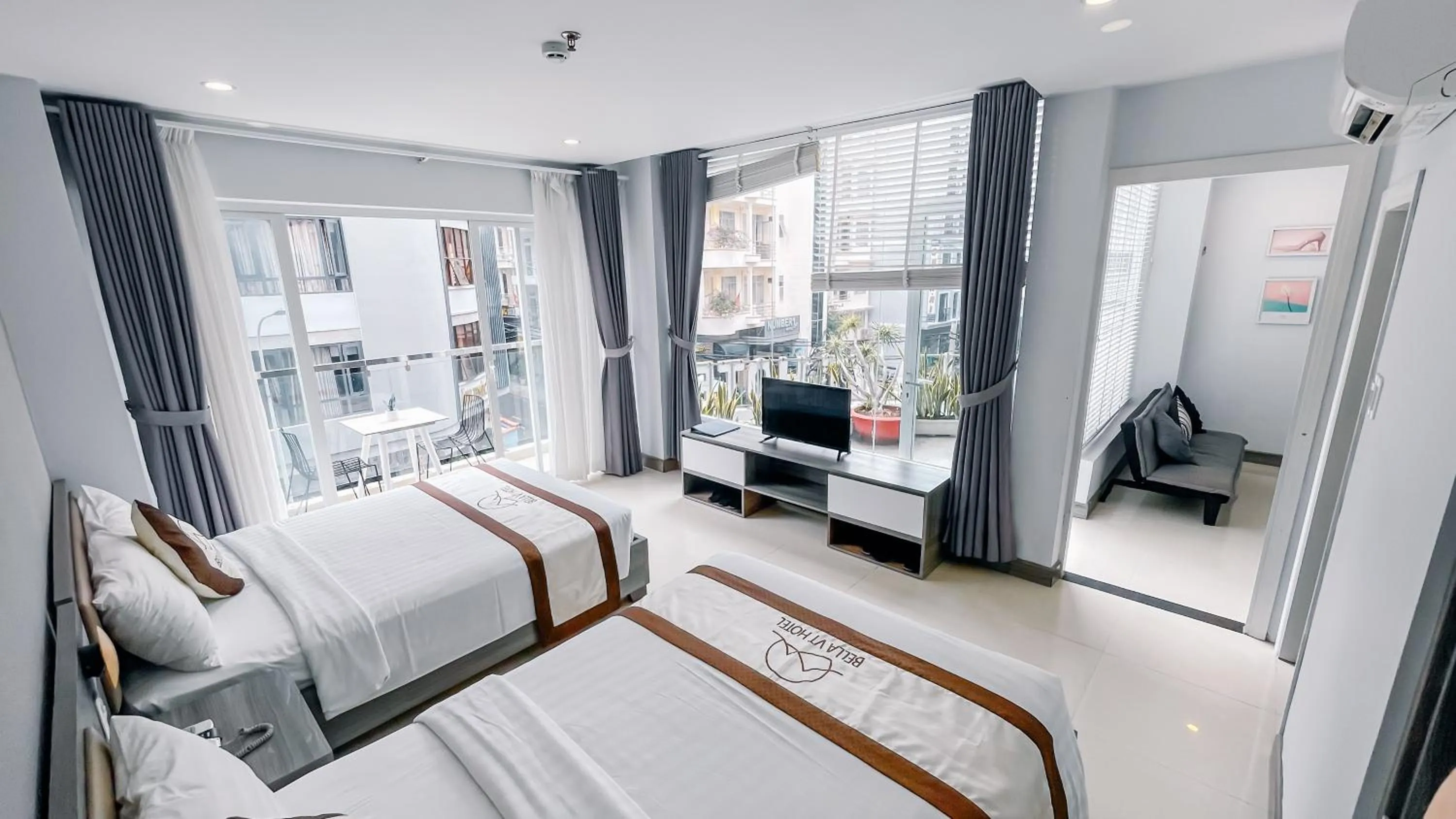 Bed in BELLA VT HOTEL