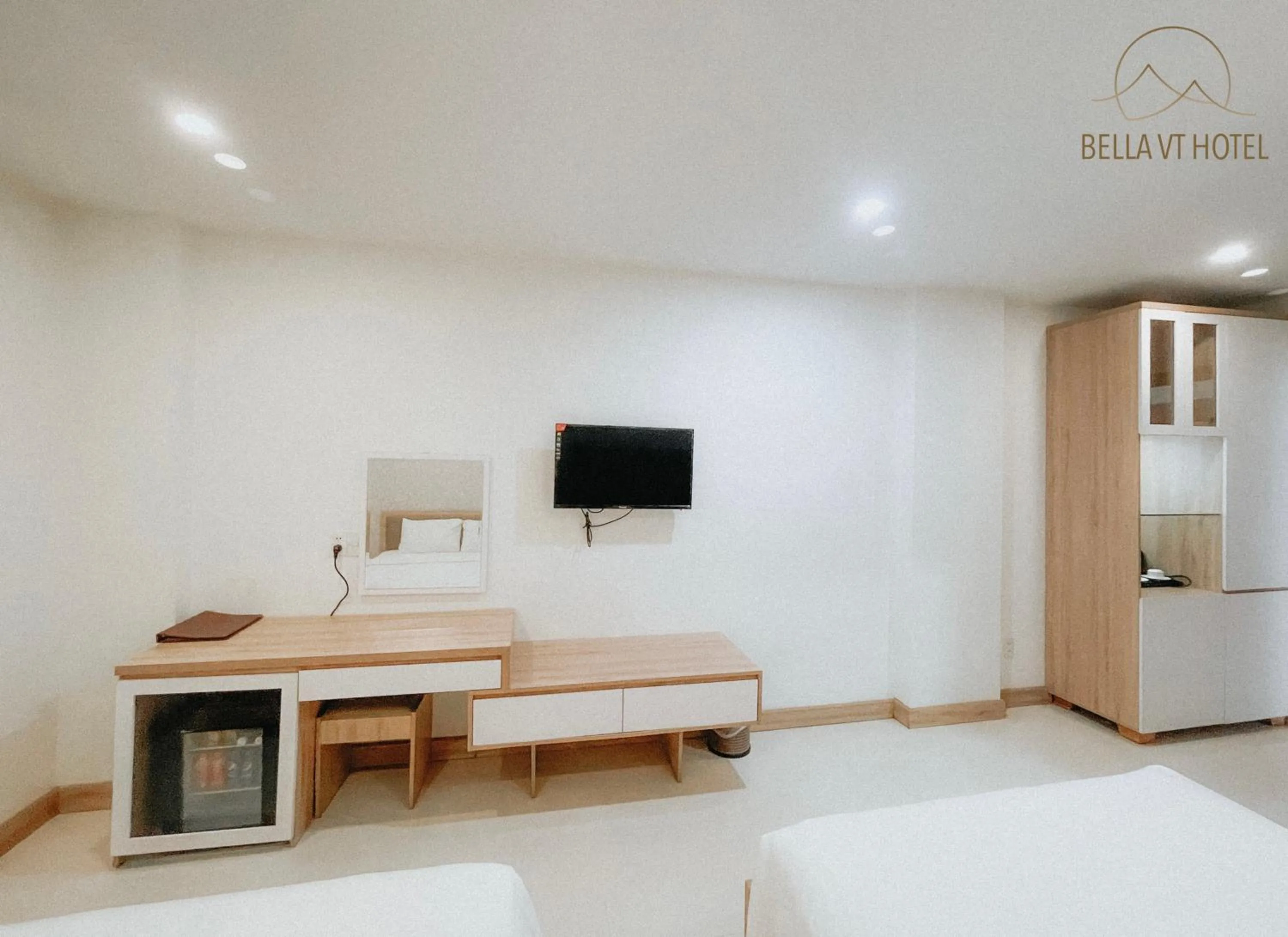 Bed in BELLA VT HOTEL