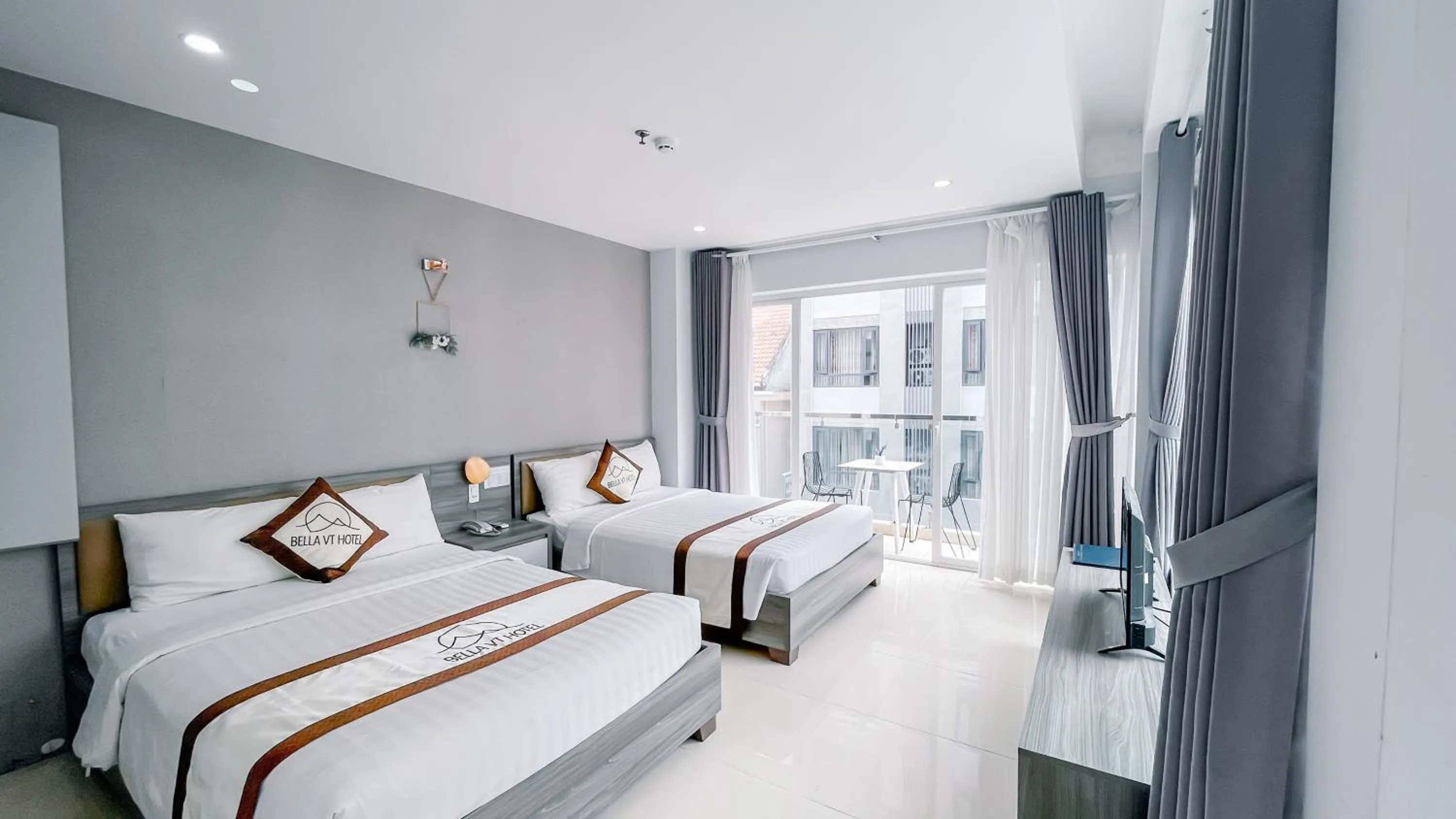 Bed in BELLA VT HOTEL