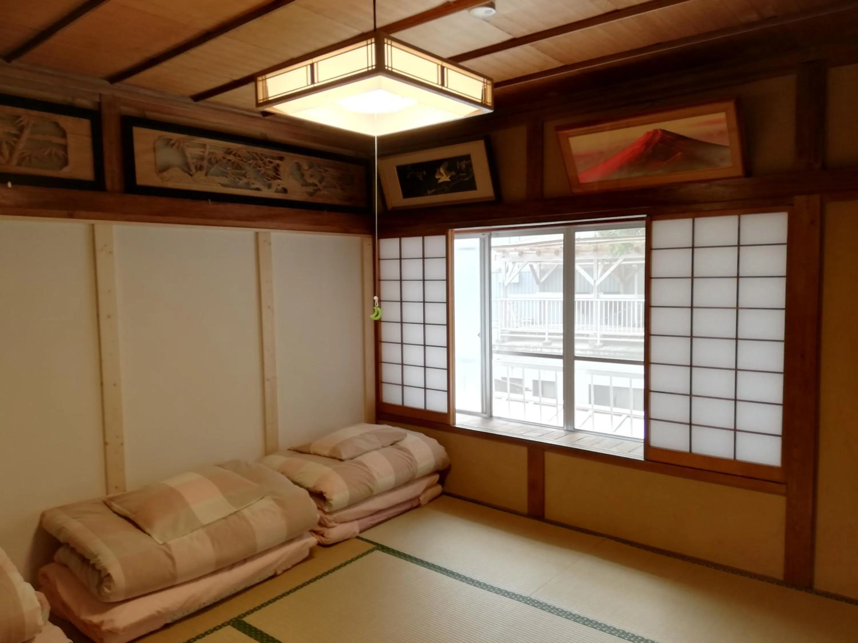 Bed in Izu Hokkawa Seaside Guesthouse 伊豆北川の家