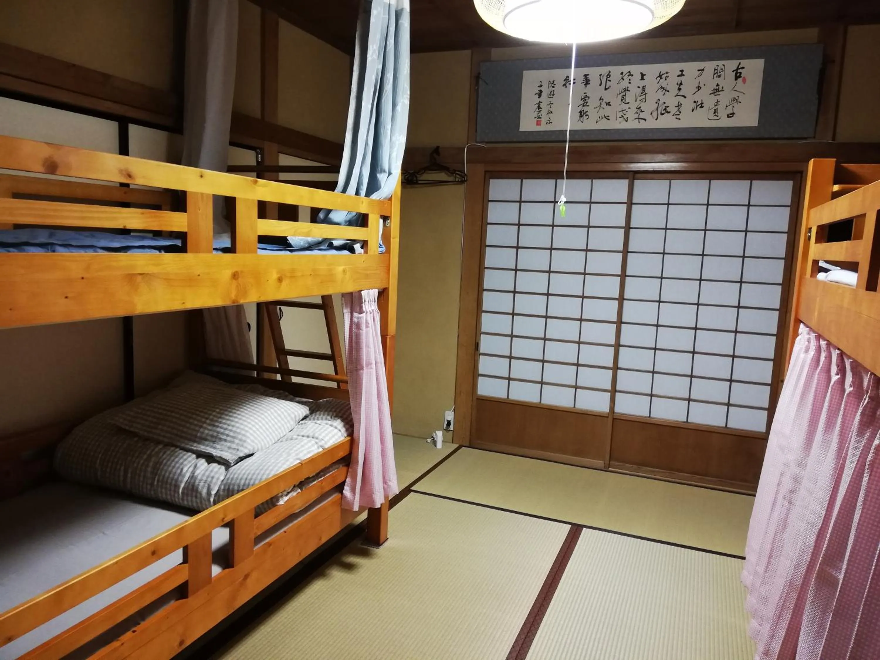 Bed in Izu Hokkawa Seaside Guesthouse 伊豆北川の家