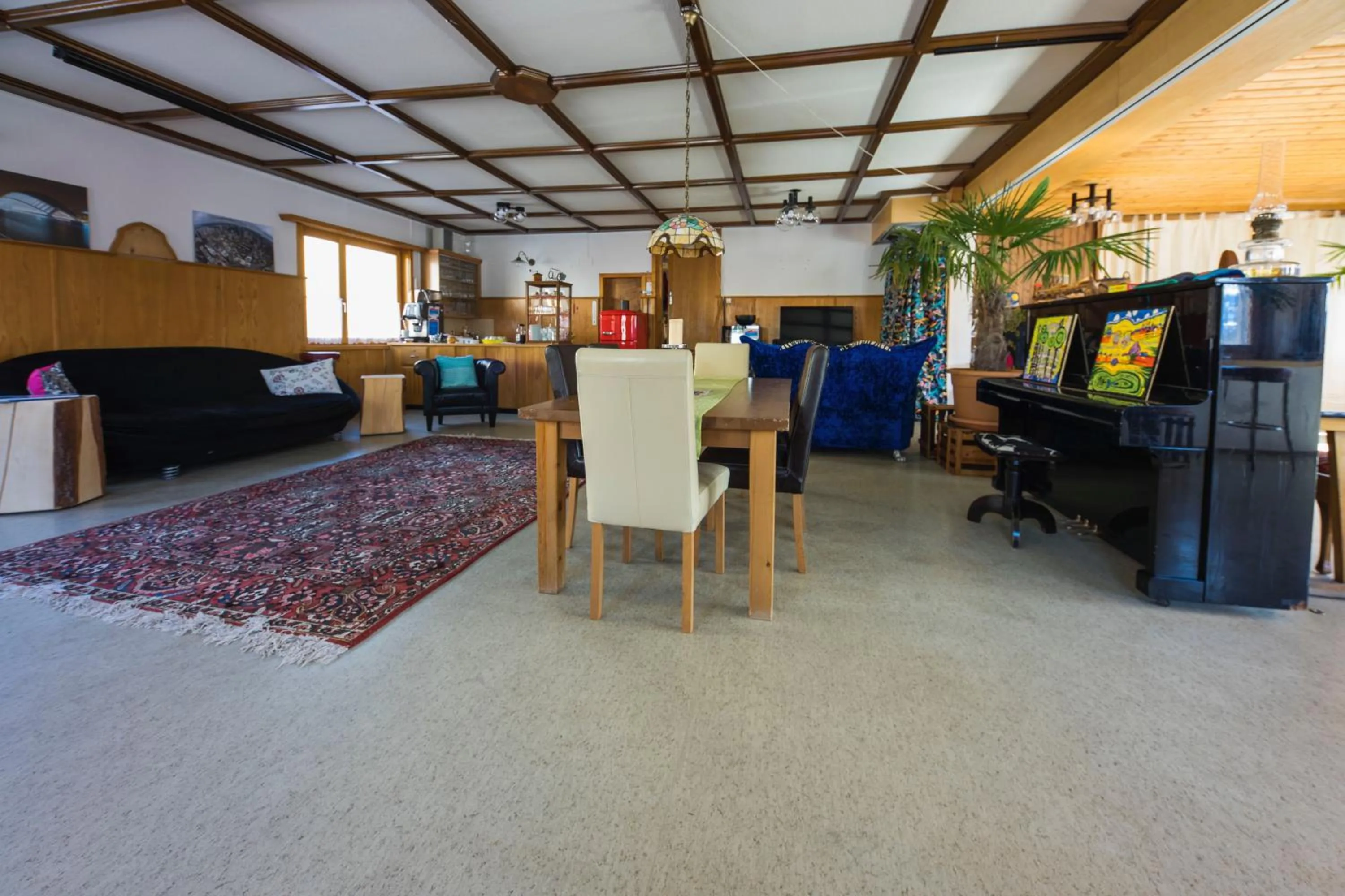 Communal lounge/ TV room in Gästehaus Alpina in Fanas