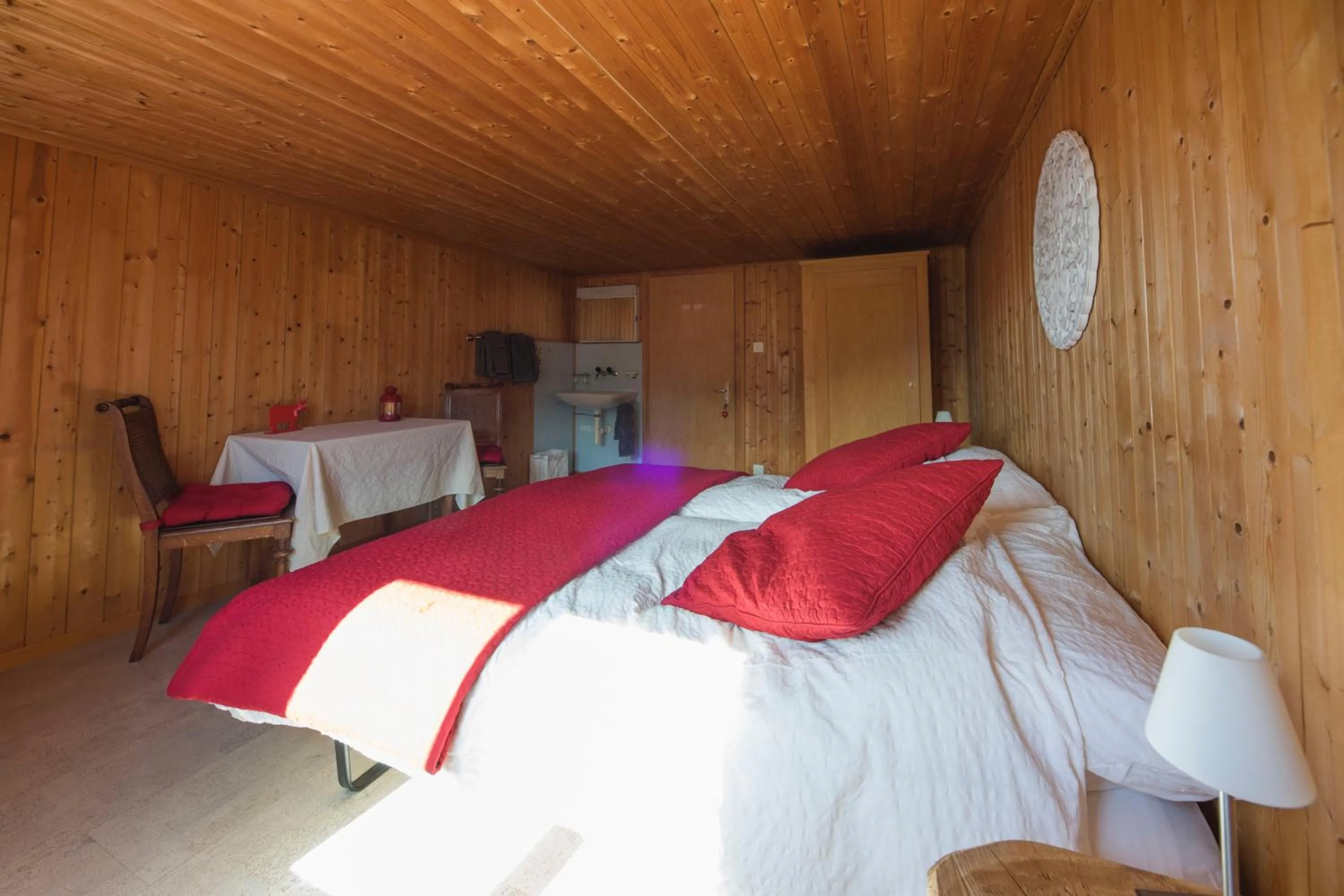 Photo of the whole room, Bed in Gästehaus Alpina in Fanas