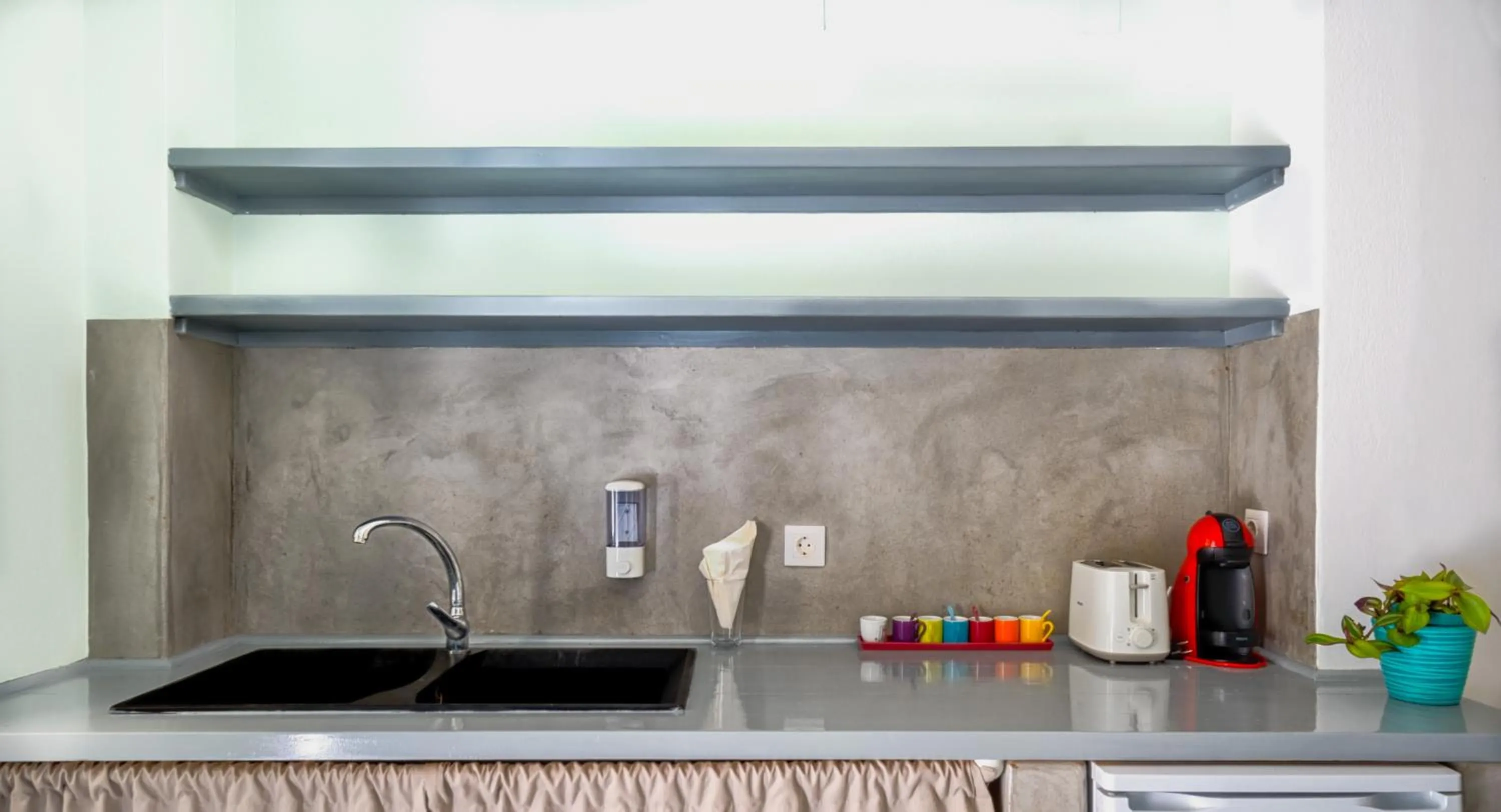 Kitchen or kitchenette in Coralli Seaside Resort