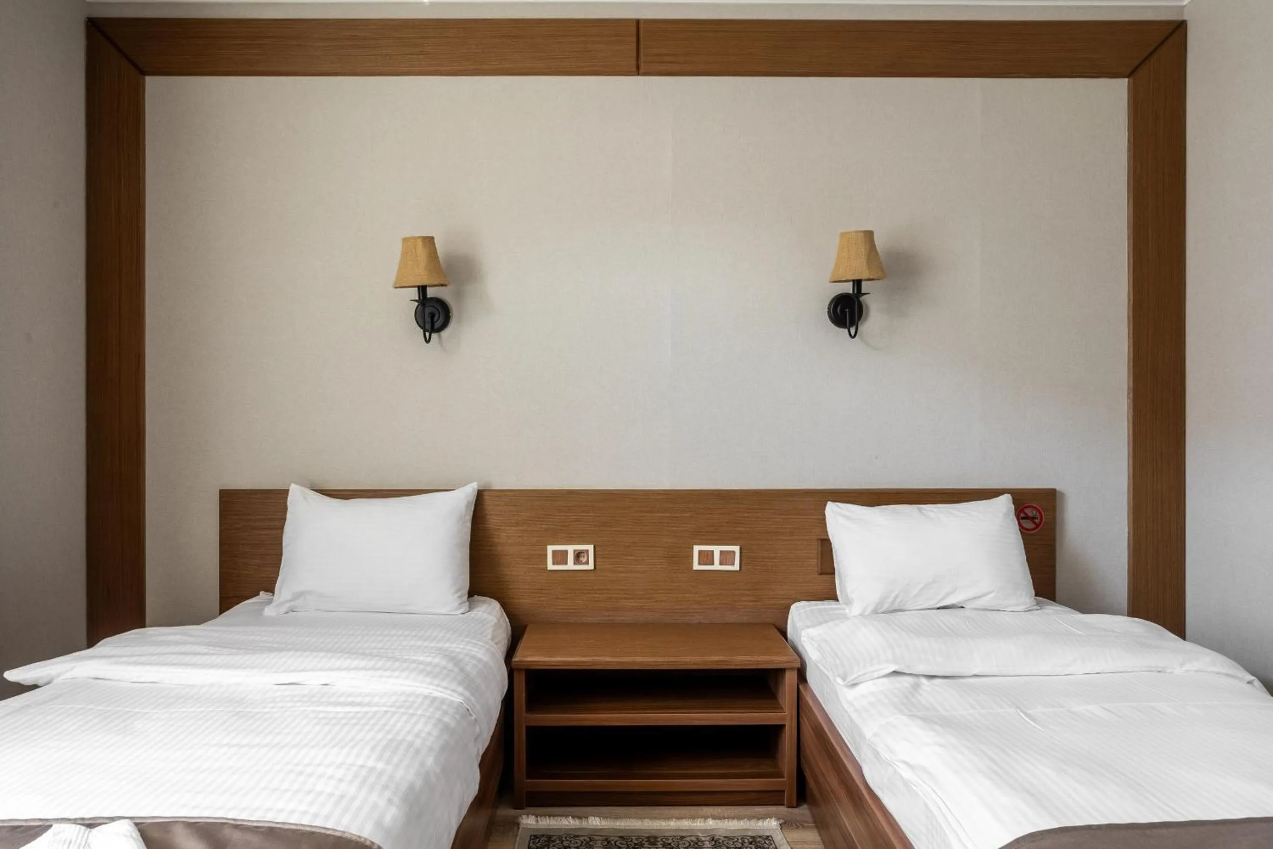 Bed in Sacvoyage Hotel