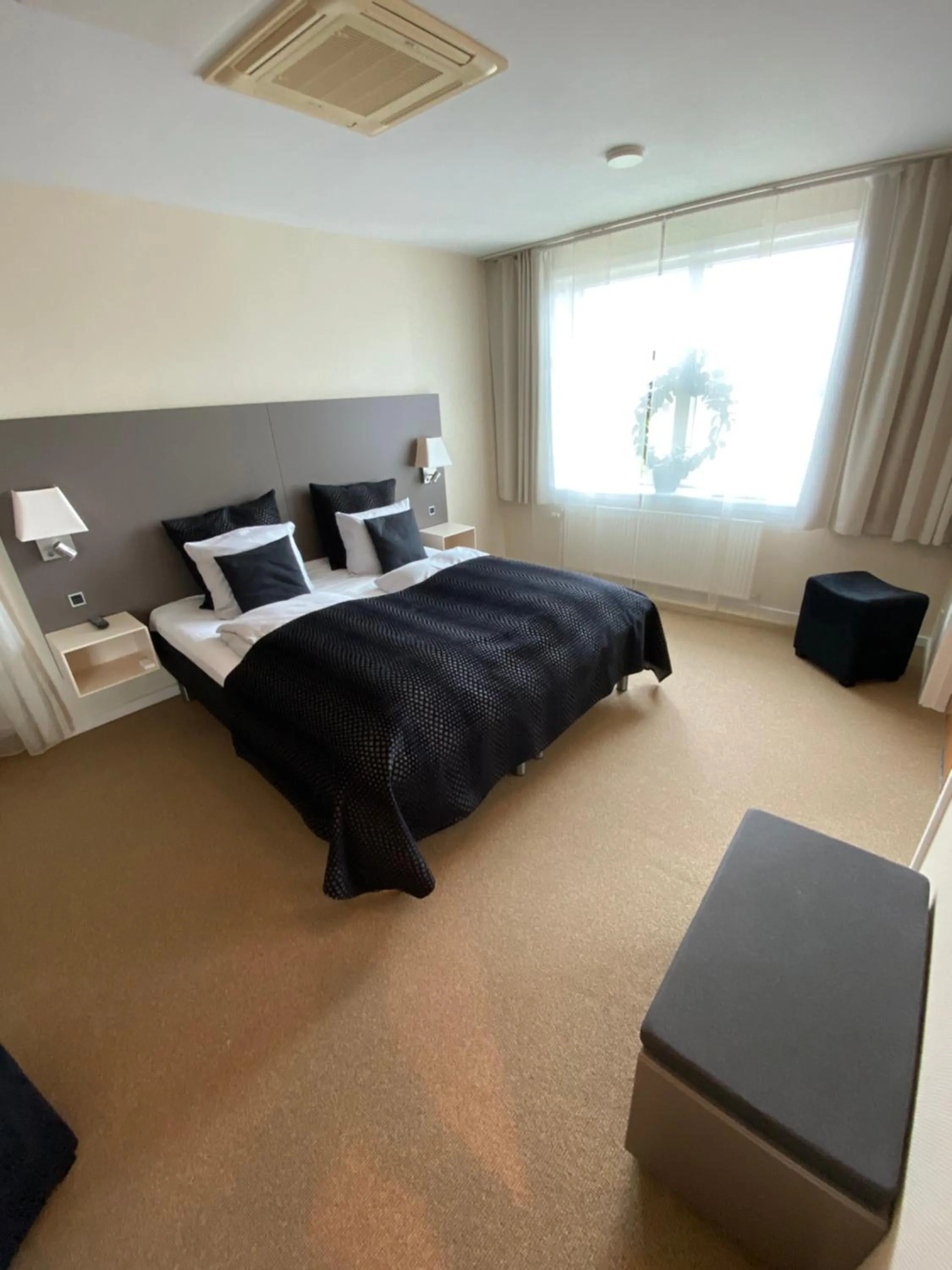 Bed in Hotel Skivehus