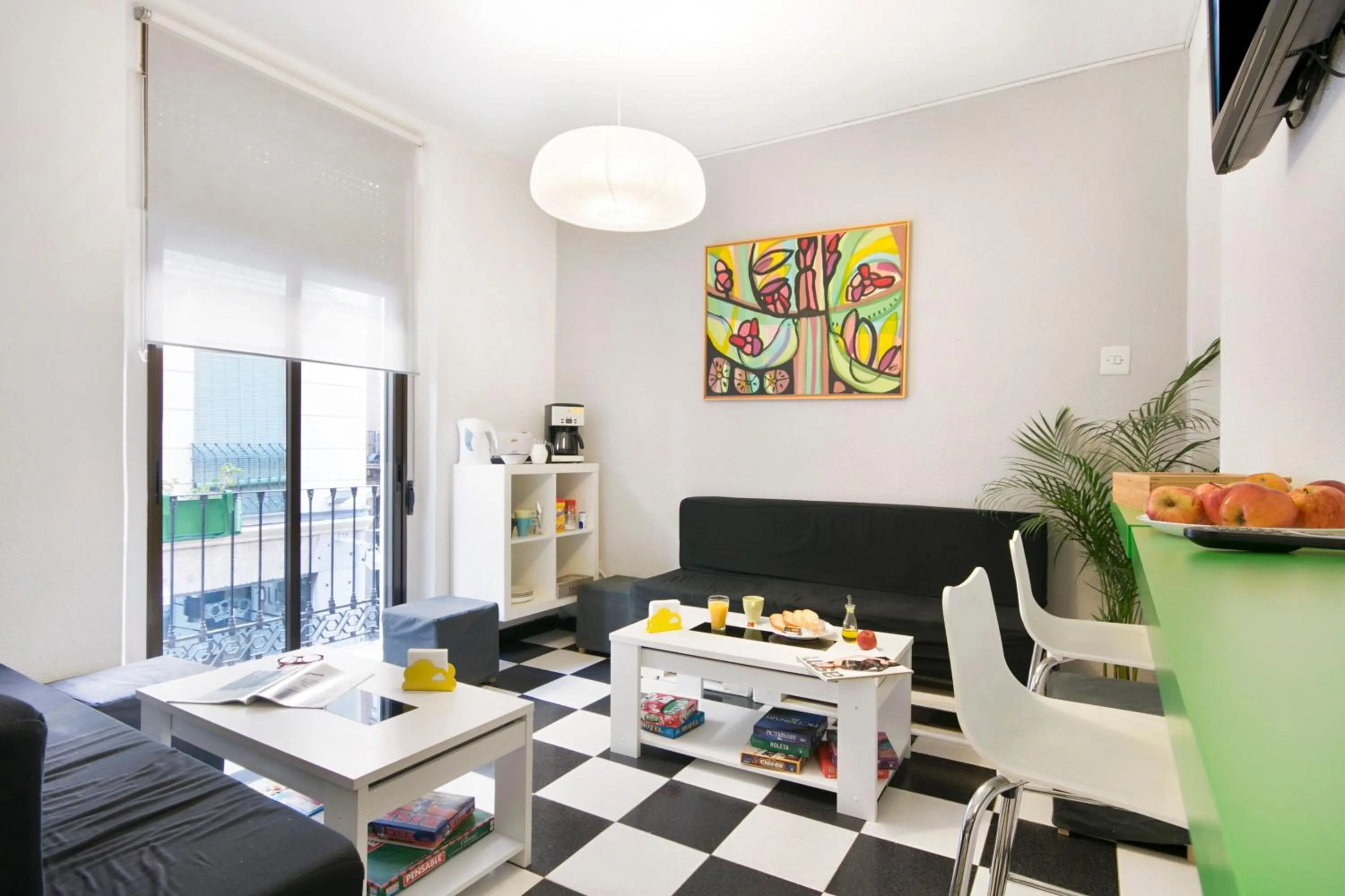 Communal lounge/ TV room in Pension Mesones