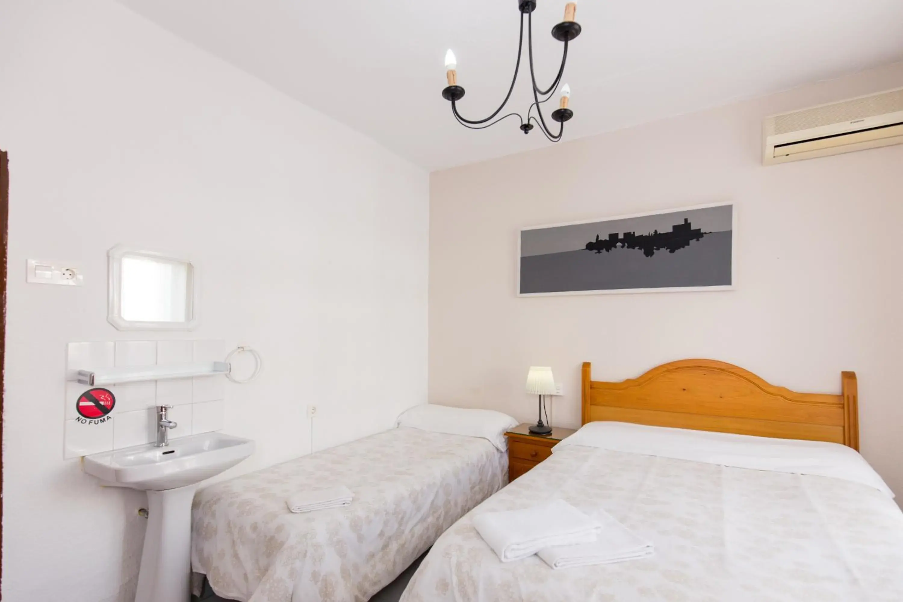 Triple Room with Private Exterior Bathroom in Pension Mesones Triple Room with Private Exterior Bathroom in Pension Mesones