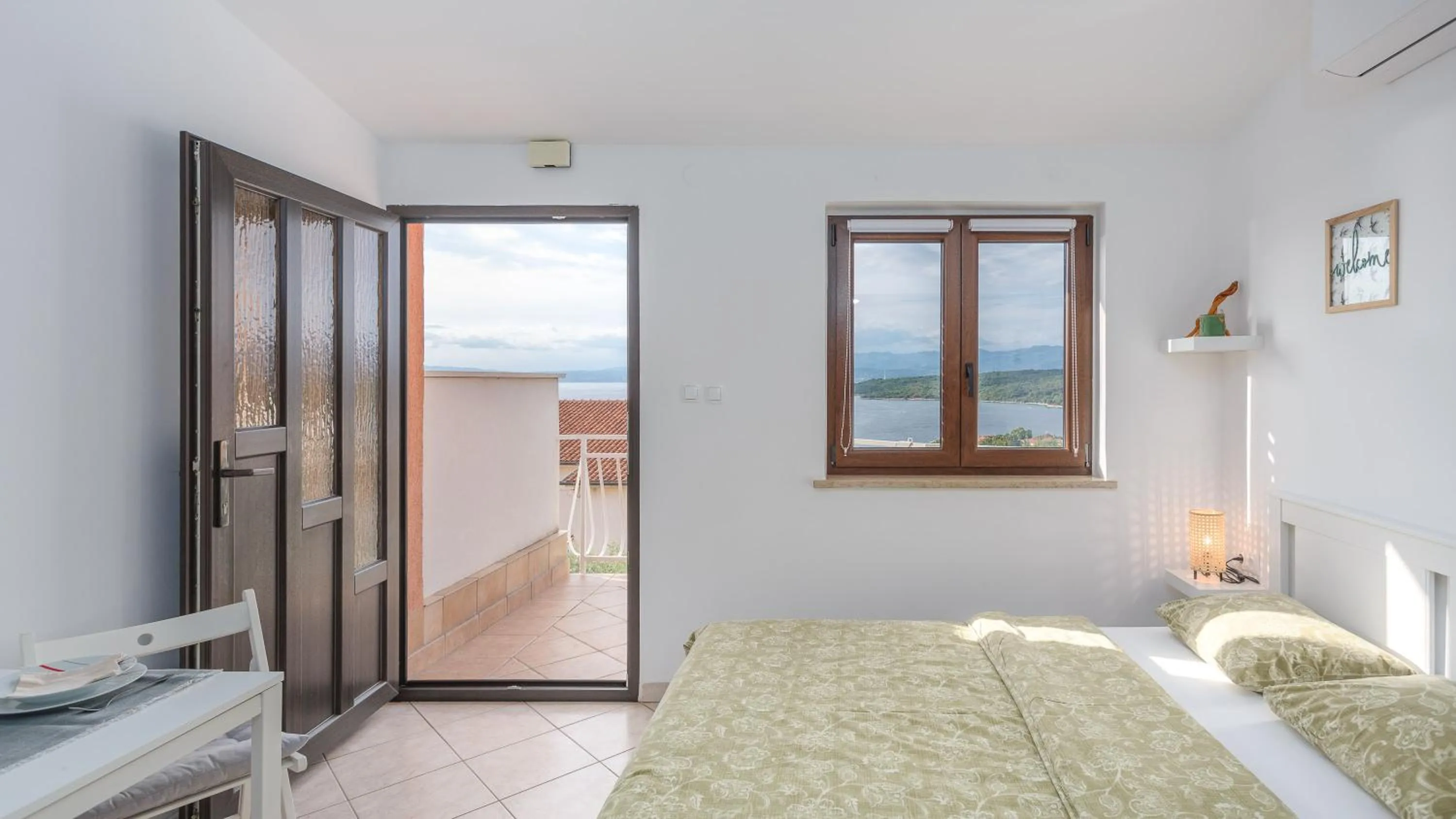 Bed in Apartment Karabaic by El-Pi Tours