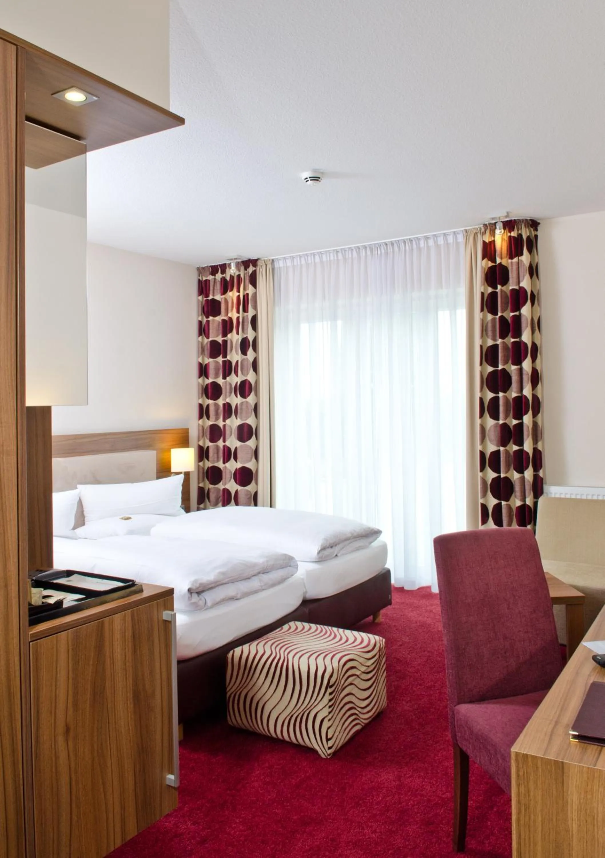 Photo of the whole room, Bed in Boutiquehotel Myn Utspann