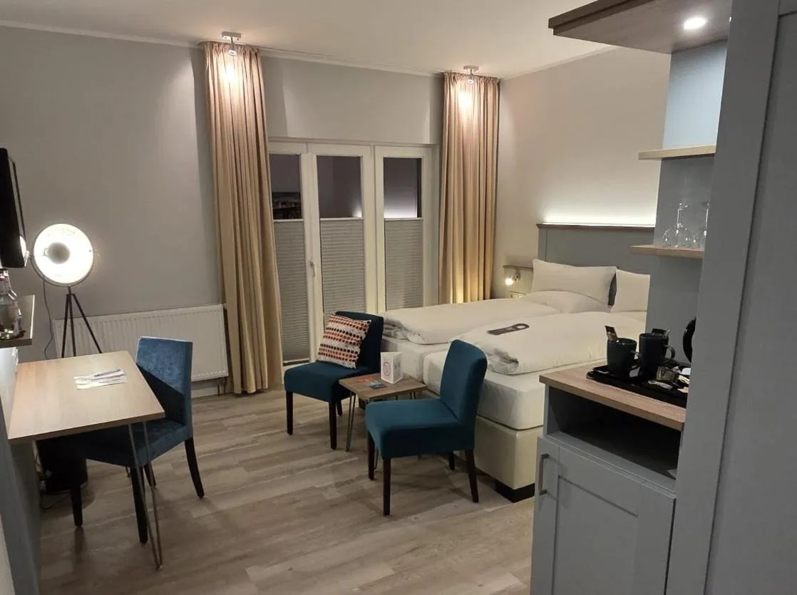 Photo of the whole room, Bed in Boutiquehotel Myn Utspann