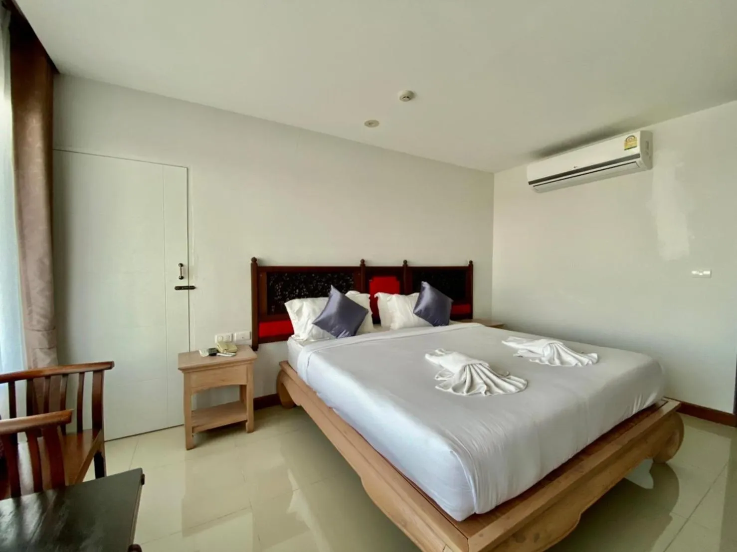 Bed in At Ruam Chok Hotel
