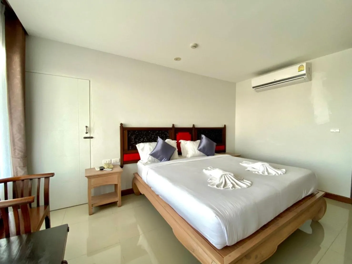 Bed in At Ruam Chok Hotel