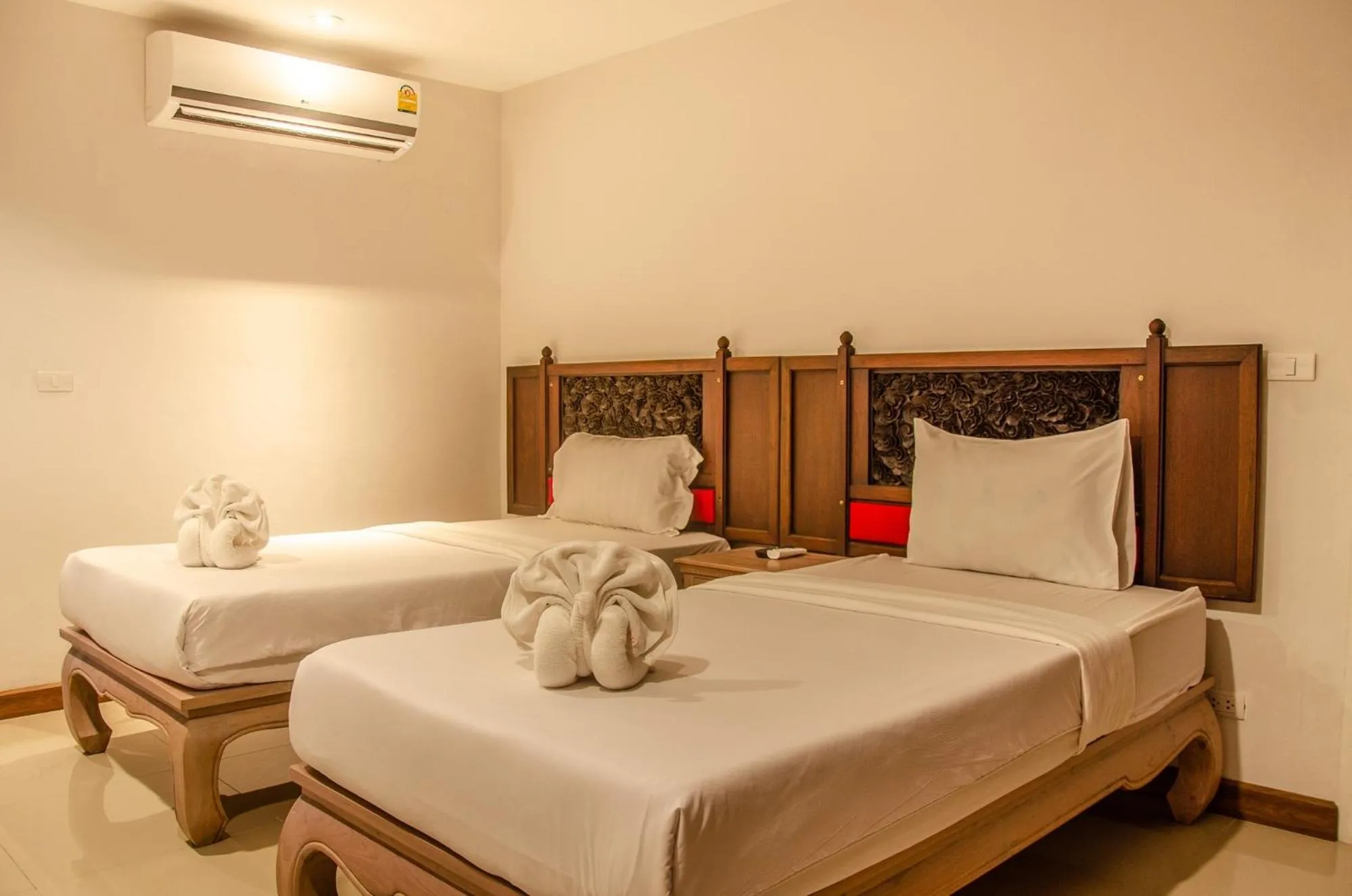 Bed in At Ruam Chok Hotel