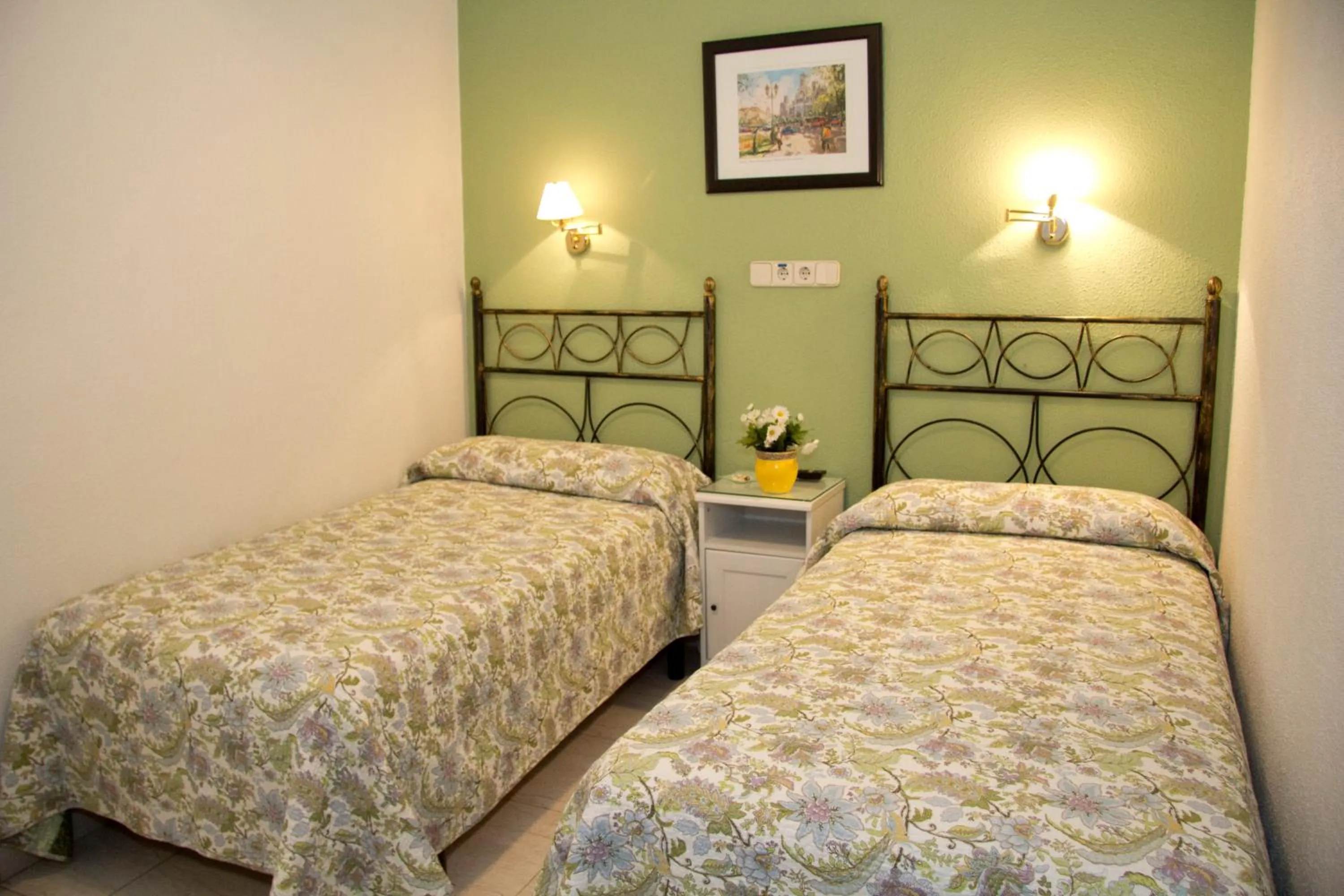 Bed in Hostal Los Alpes