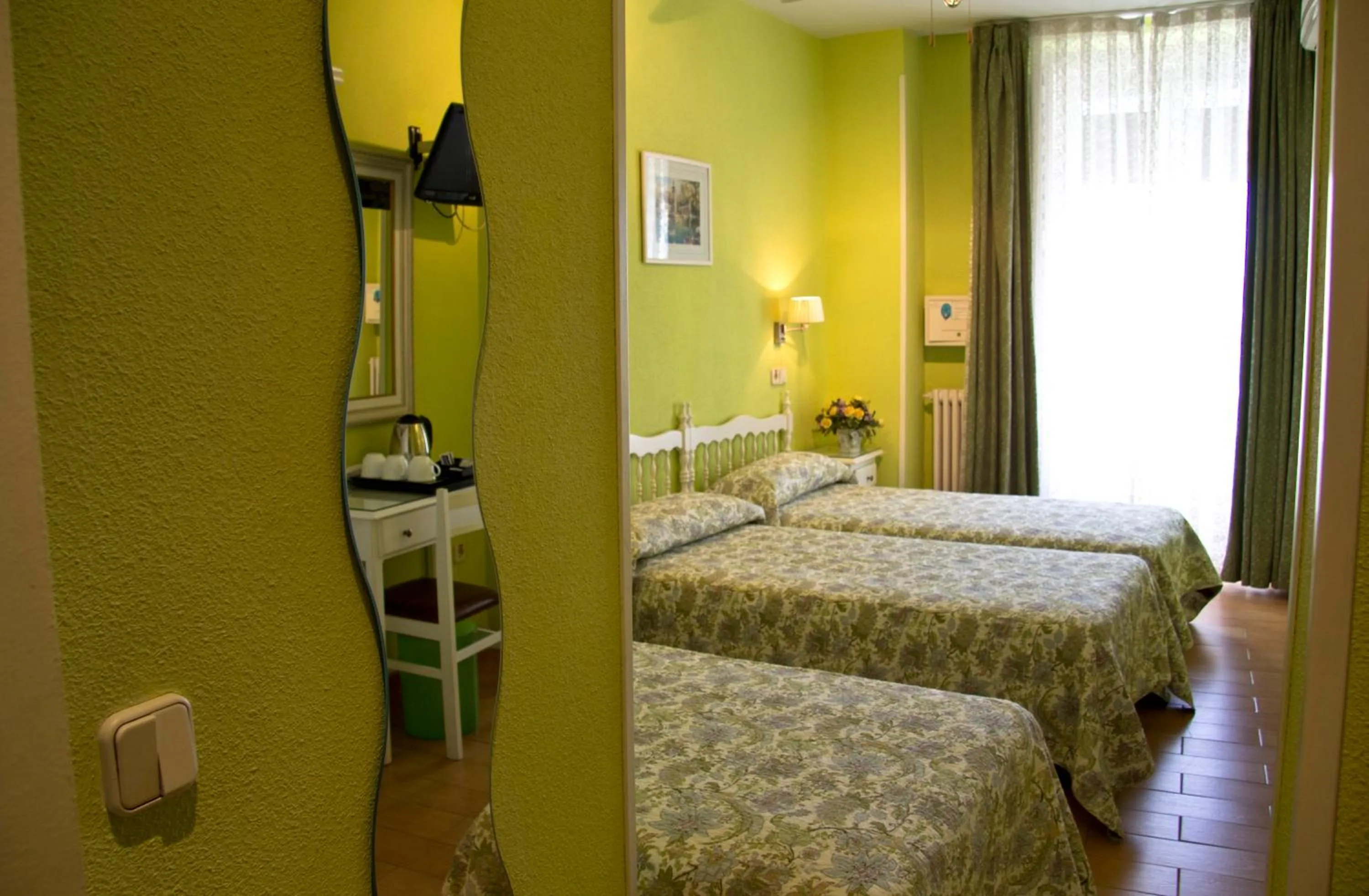 Bed in Hostal Los Alpes