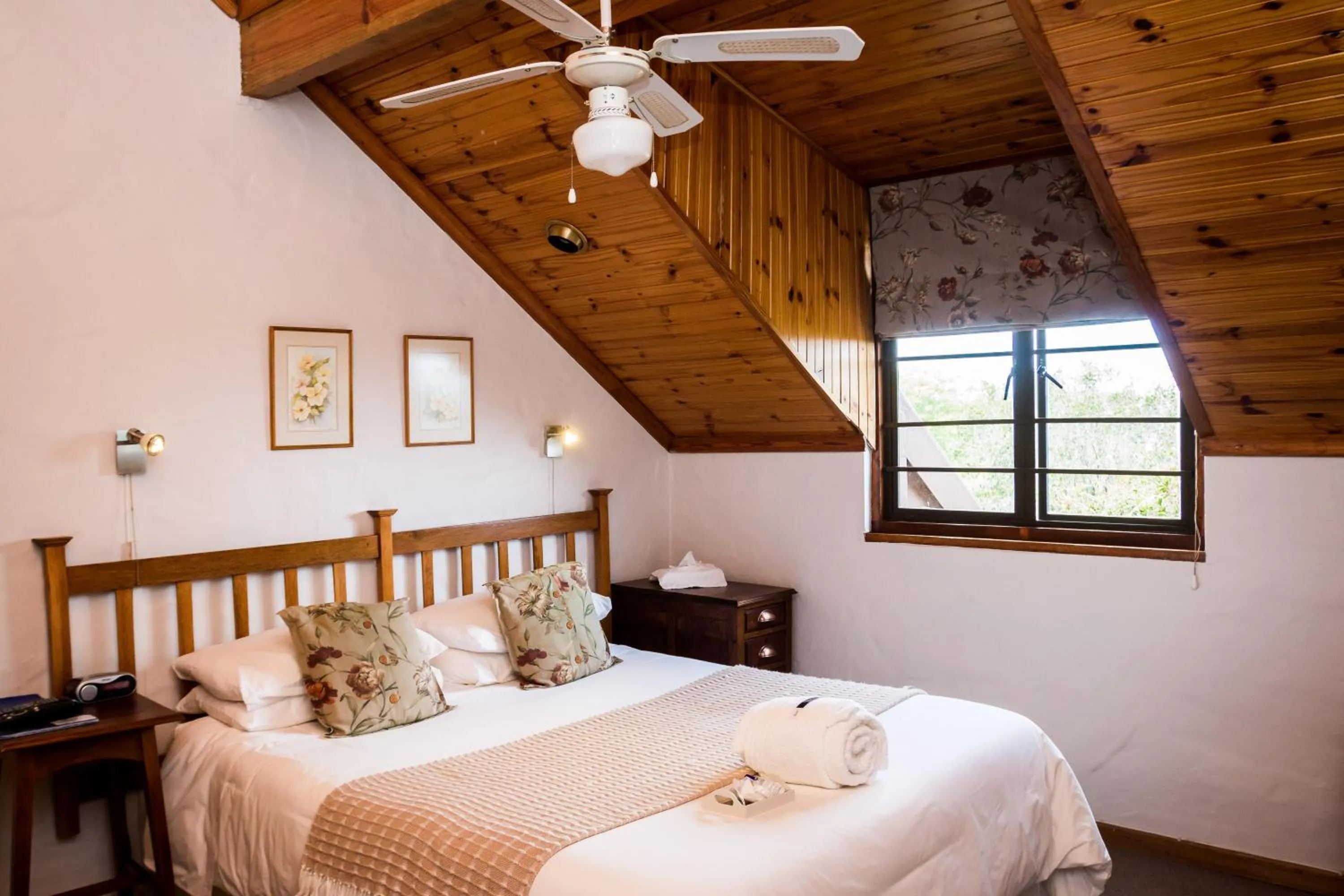 Bed in Jenny's Guest House