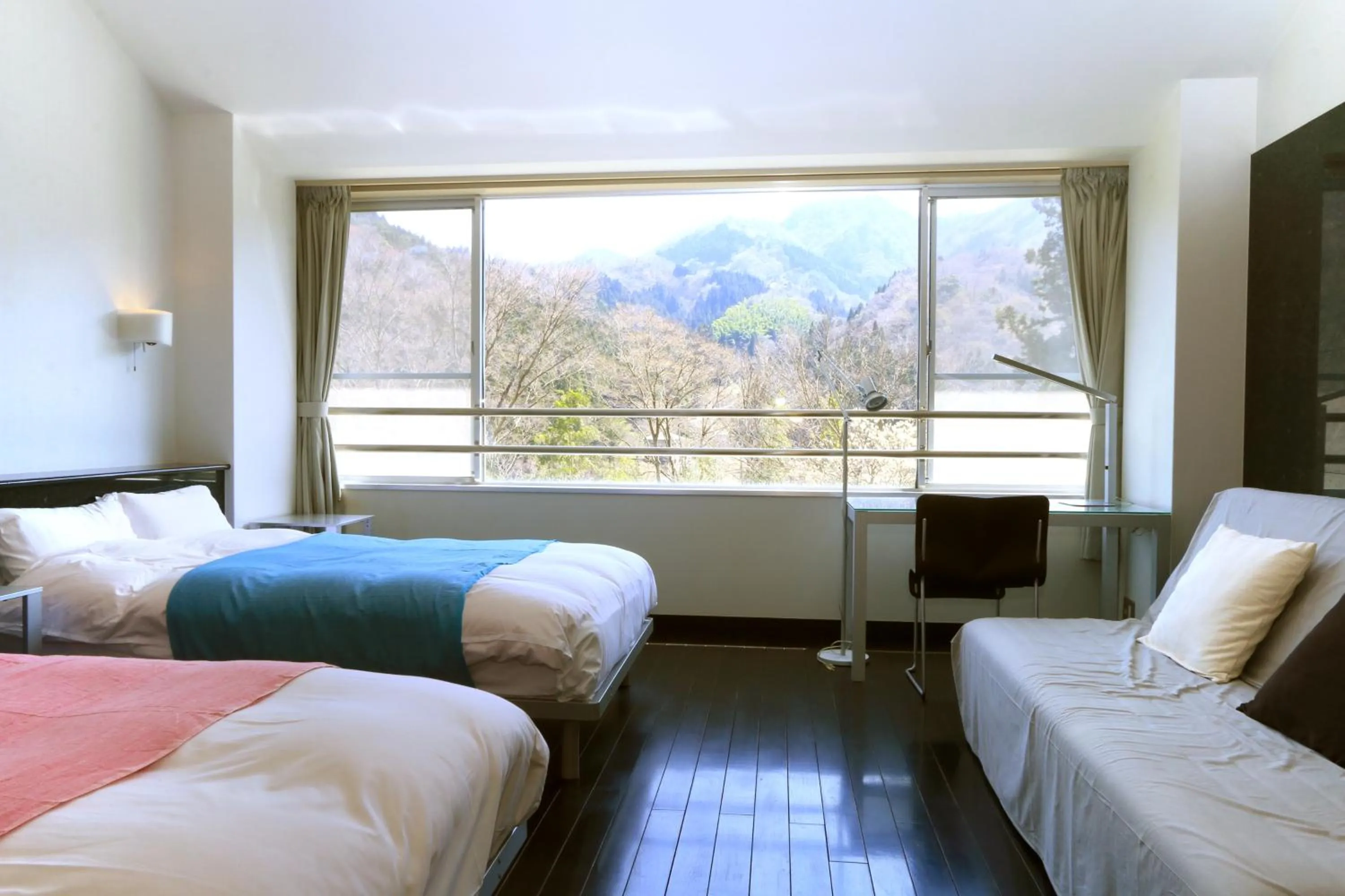 Bed in Sora no Mori Hotel Hanagori