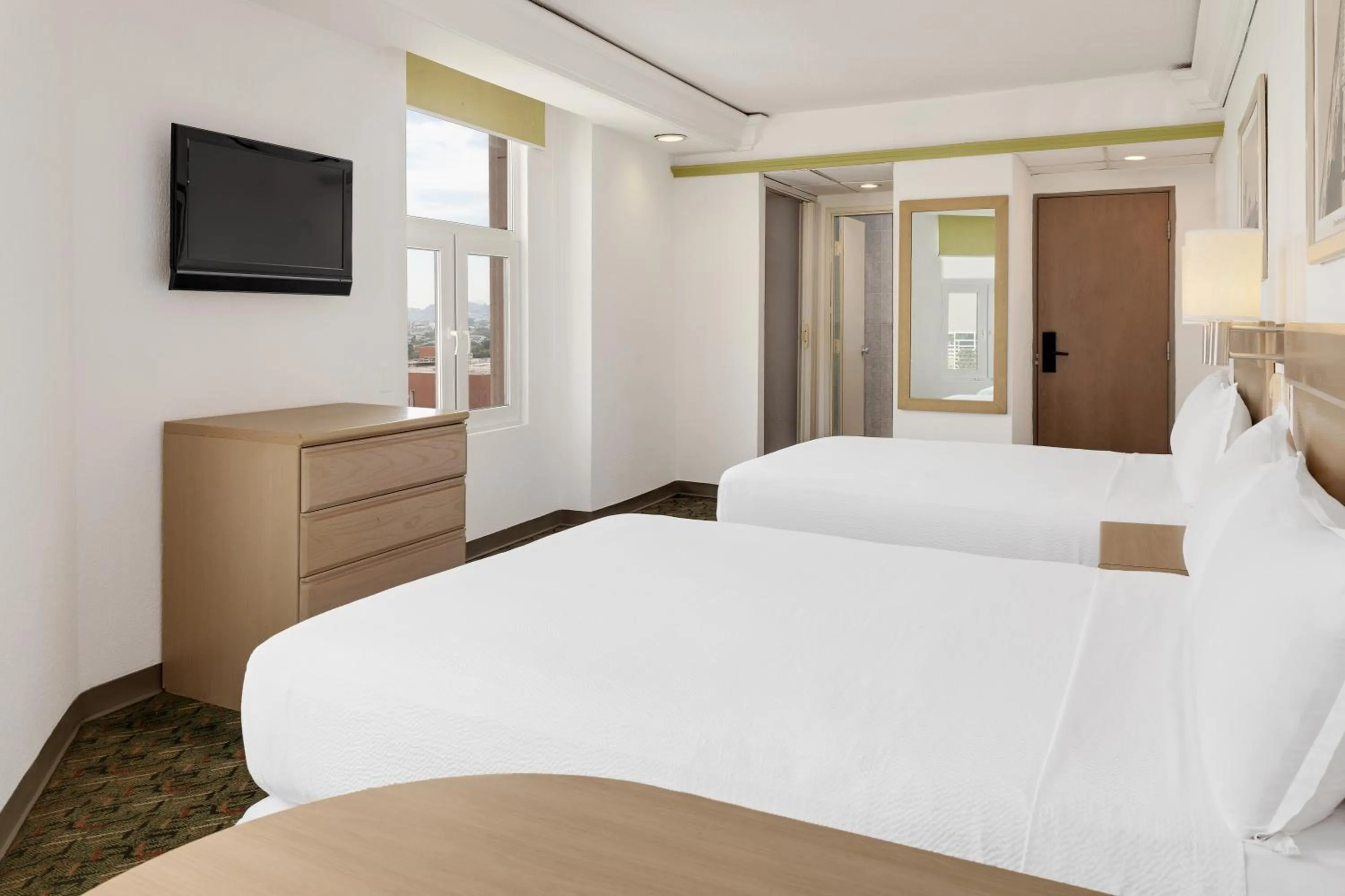 Photo of the whole room, Bed in Hotel Monterrey Macroplaza