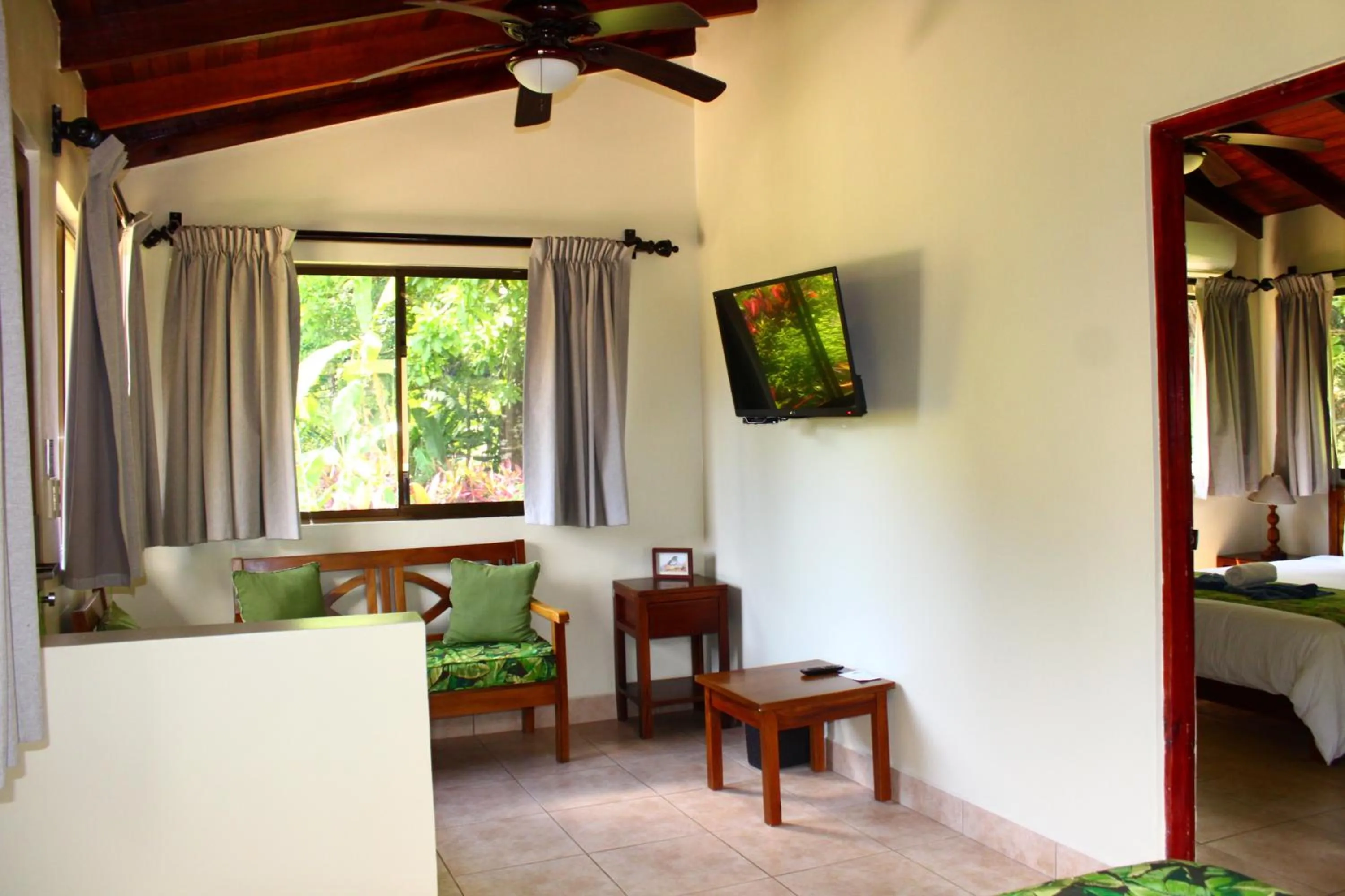 Living room, Bed in La Foresta Nature Resort