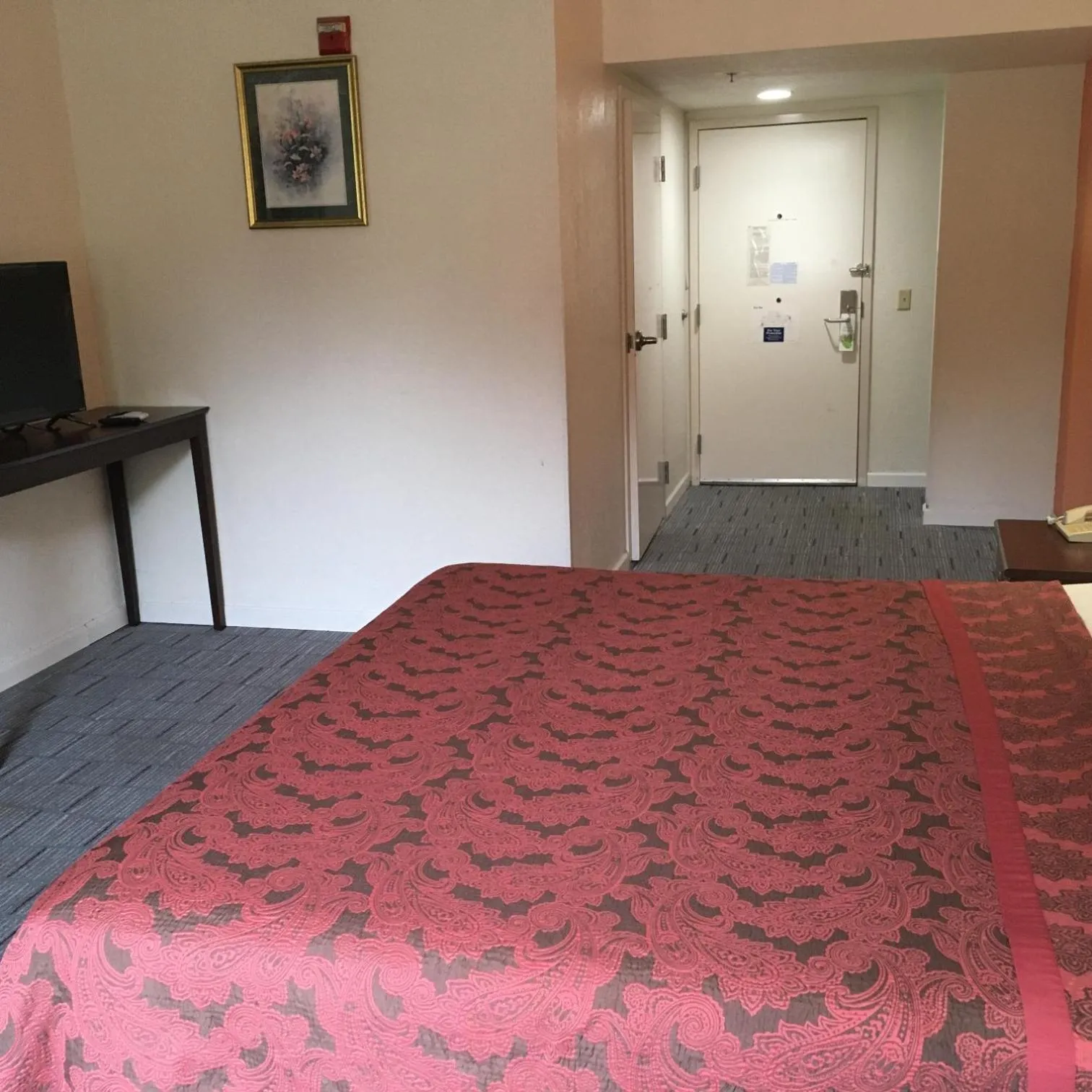 Bed in President Inn & Suites