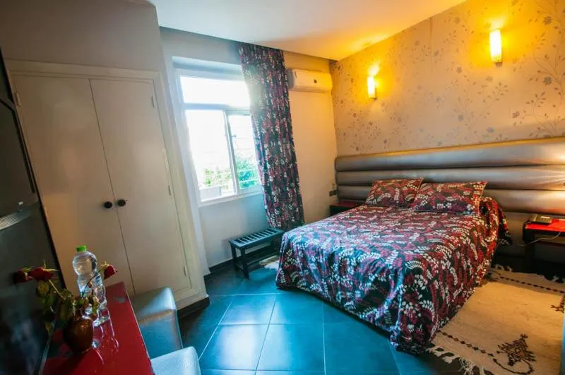 Bed in Hotel De La Paix