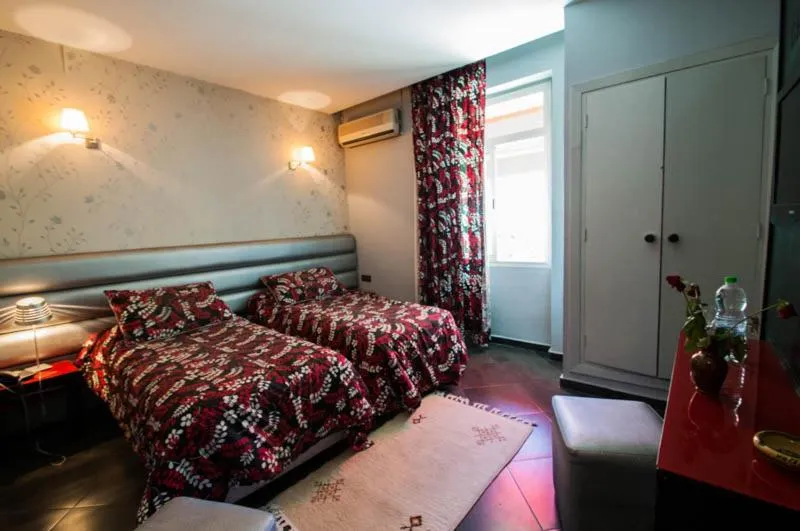 Bed in Hotel De La Paix