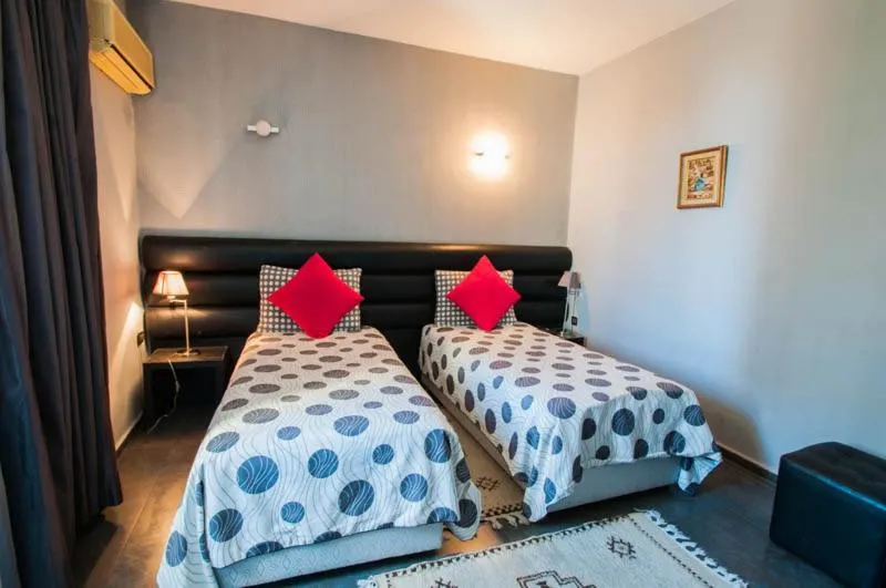 Bed in Hotel De La Paix