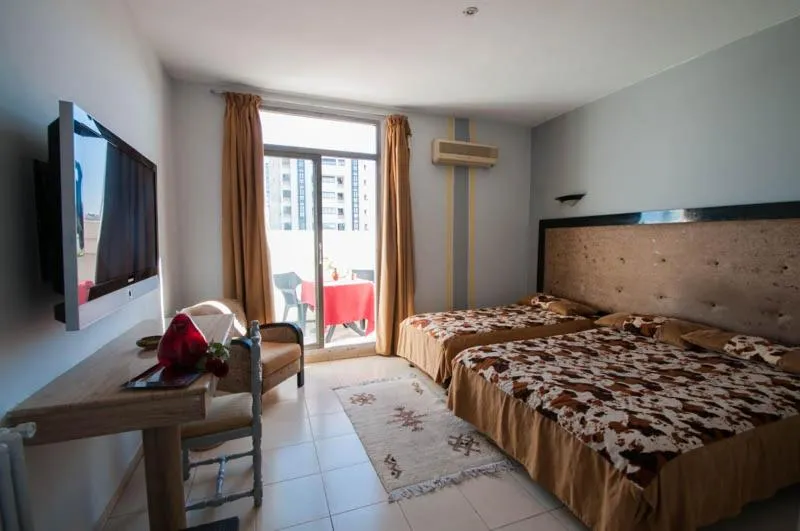 Bed in Hotel De La Paix