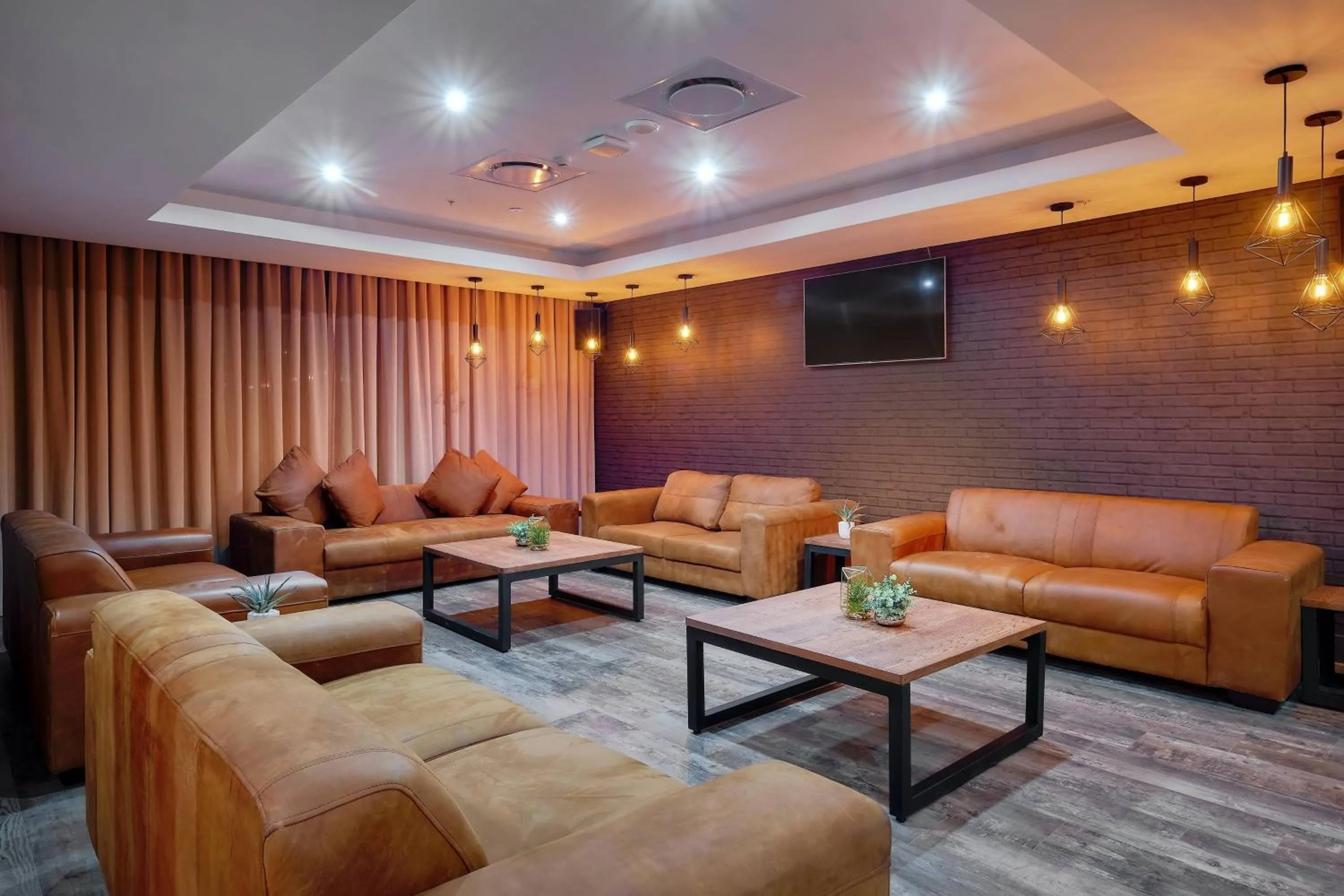 Lounge or bar in Protea Hotel by Marriott Pretoria Loftus Park