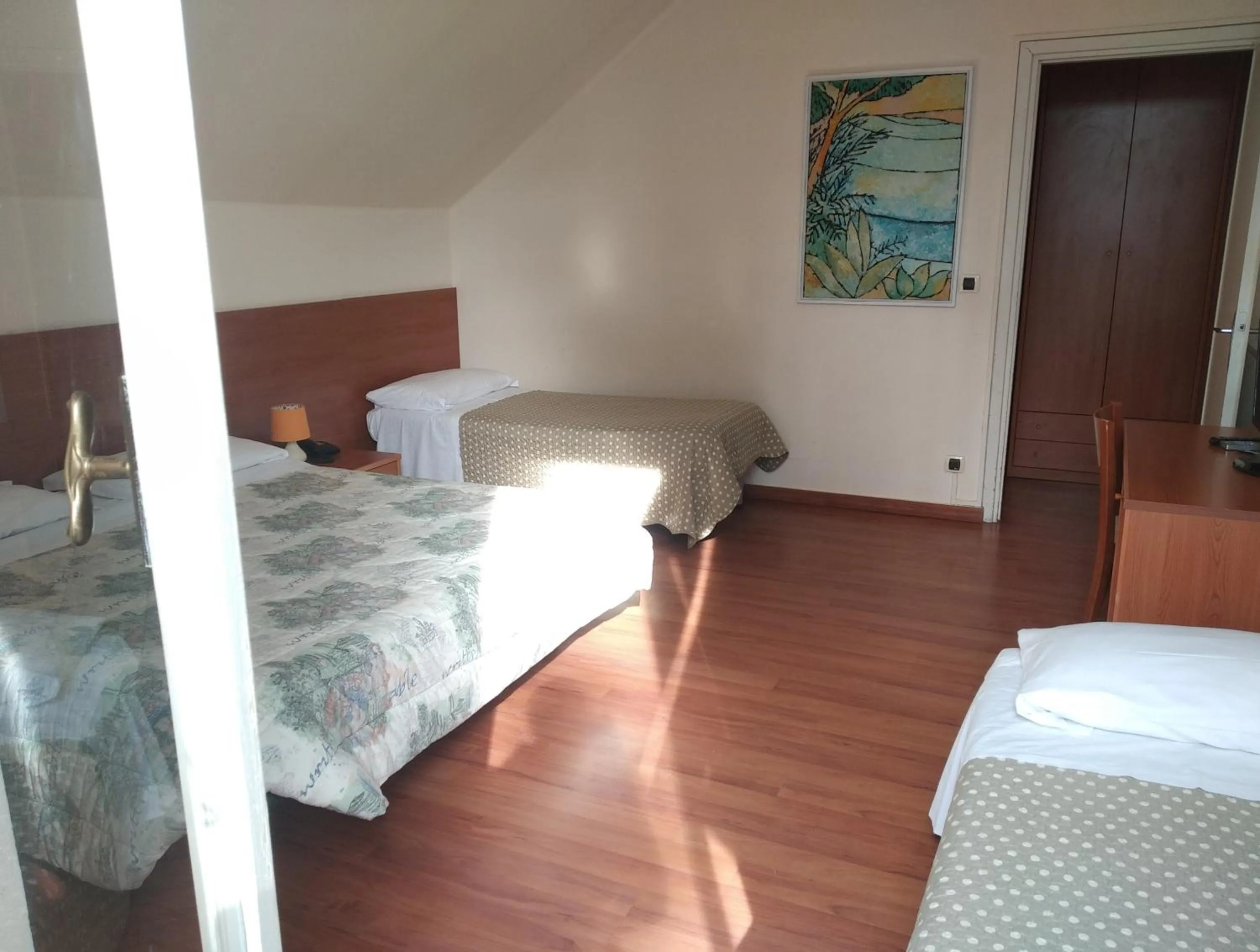 Bed in Hotel Lucciola