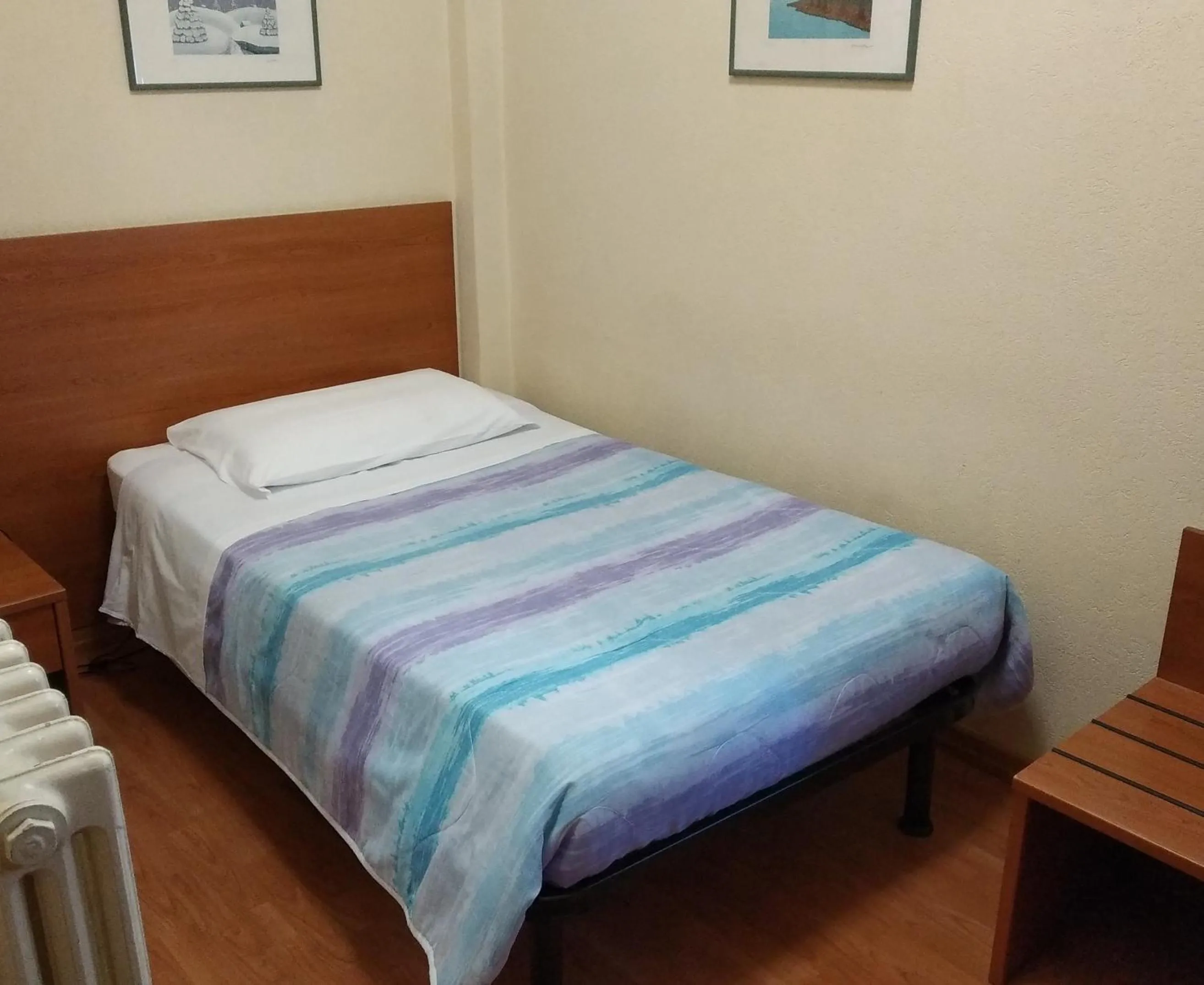 Bed in Hotel Lucciola