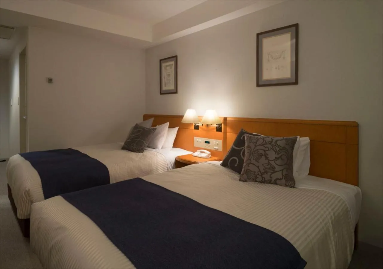 Bed in Kanazawa New Grand Hotel Premier