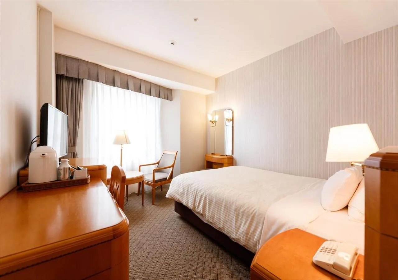 Photo of the whole room, Bed in Kanazawa New Grand Hotel Premier