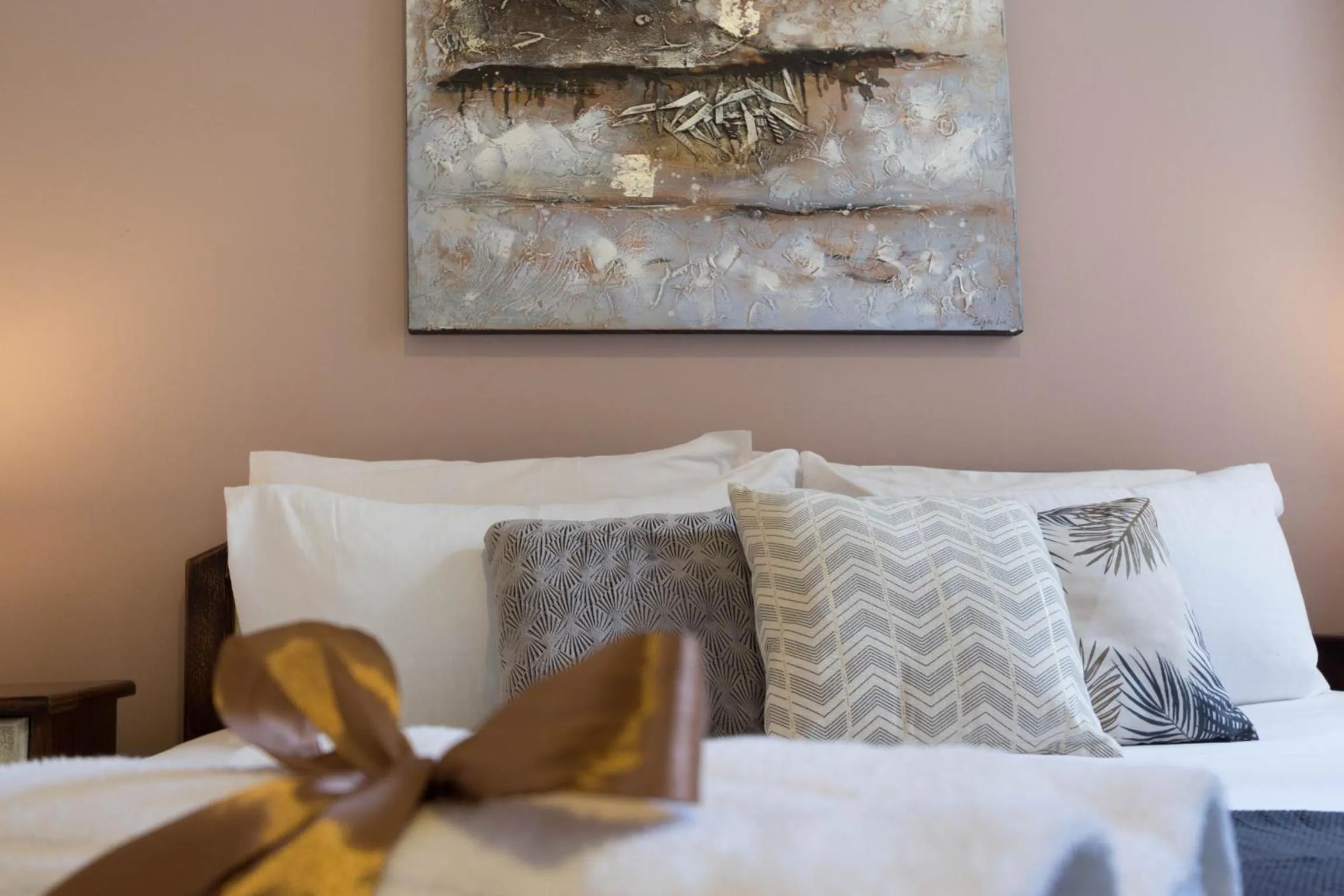 Bed in Arcobaleno Rooms