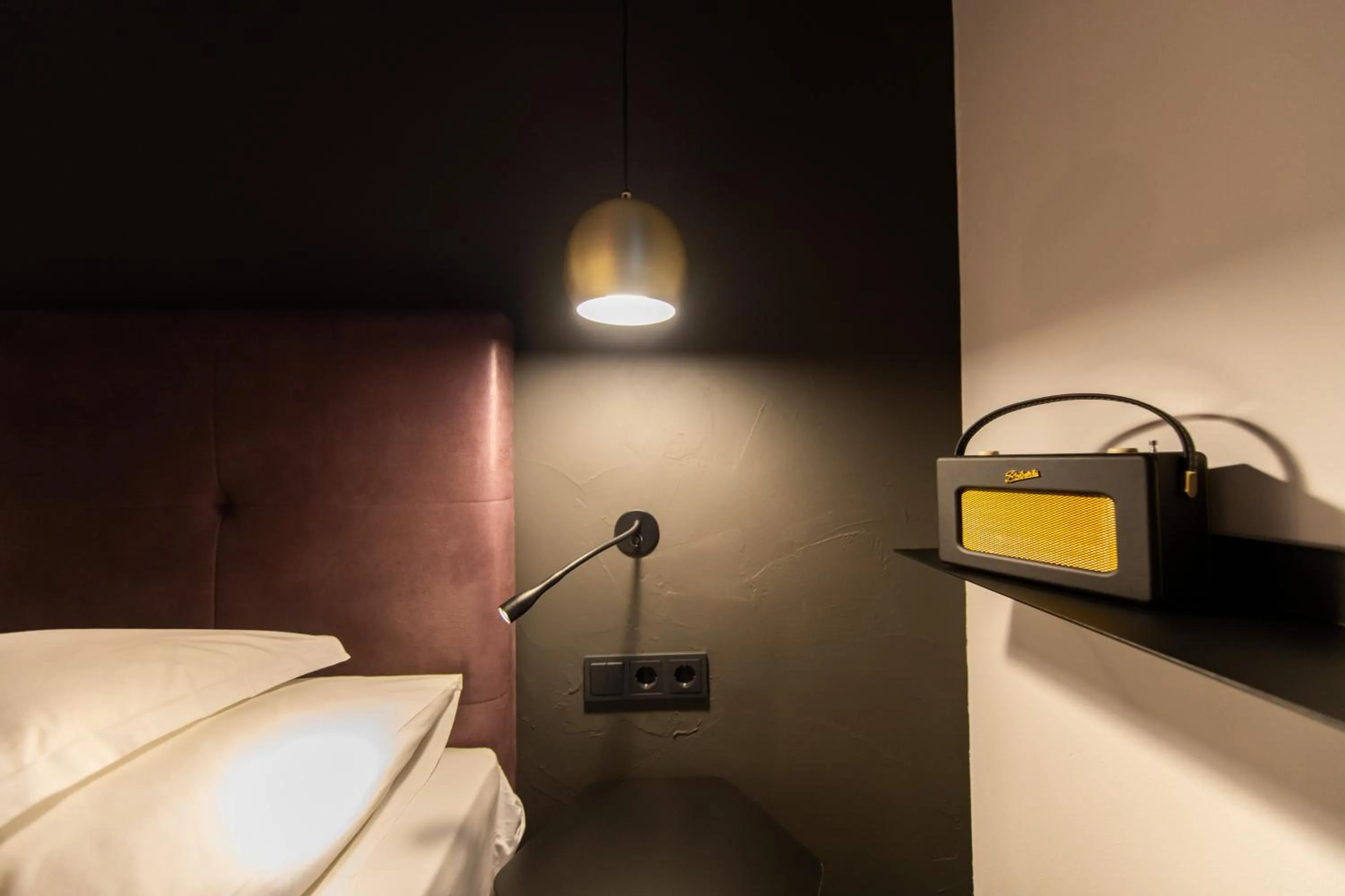 Decorative detail, Bed in Burgus - Design Suites & Apartments