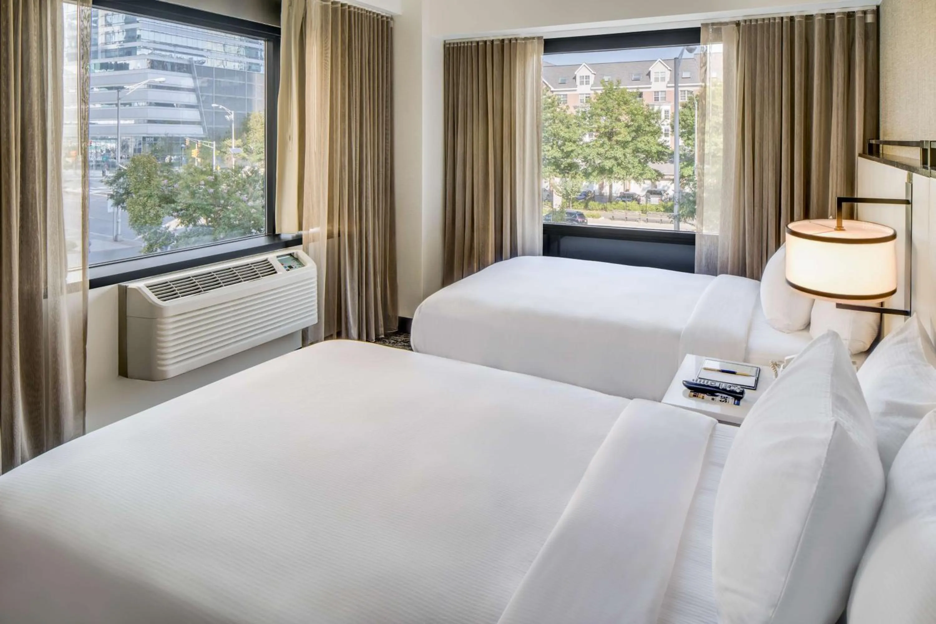 Bed in DoubleTree by Hilton Hotel & Suites Jersey City