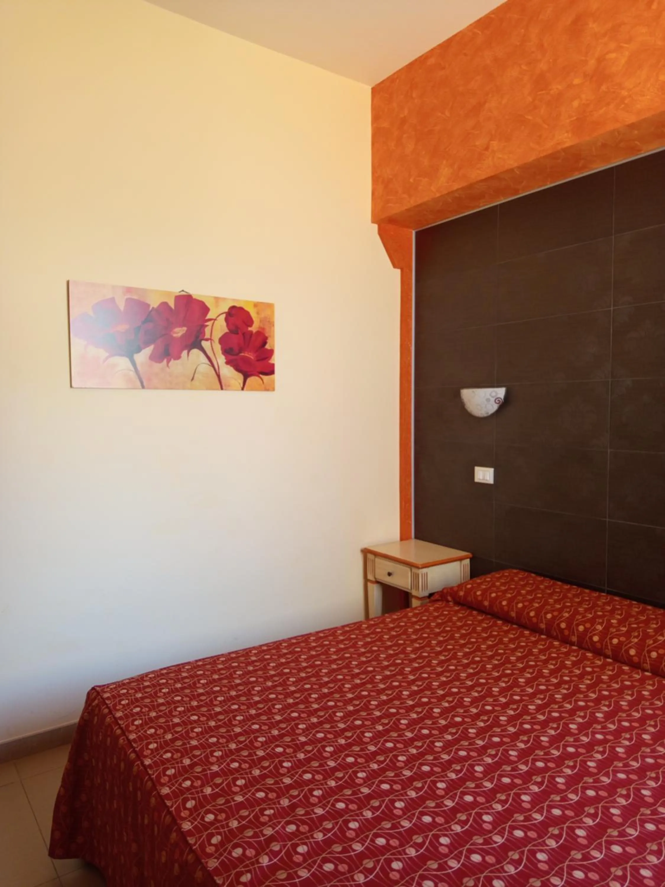 Bedroom in Amaryllis Hotel