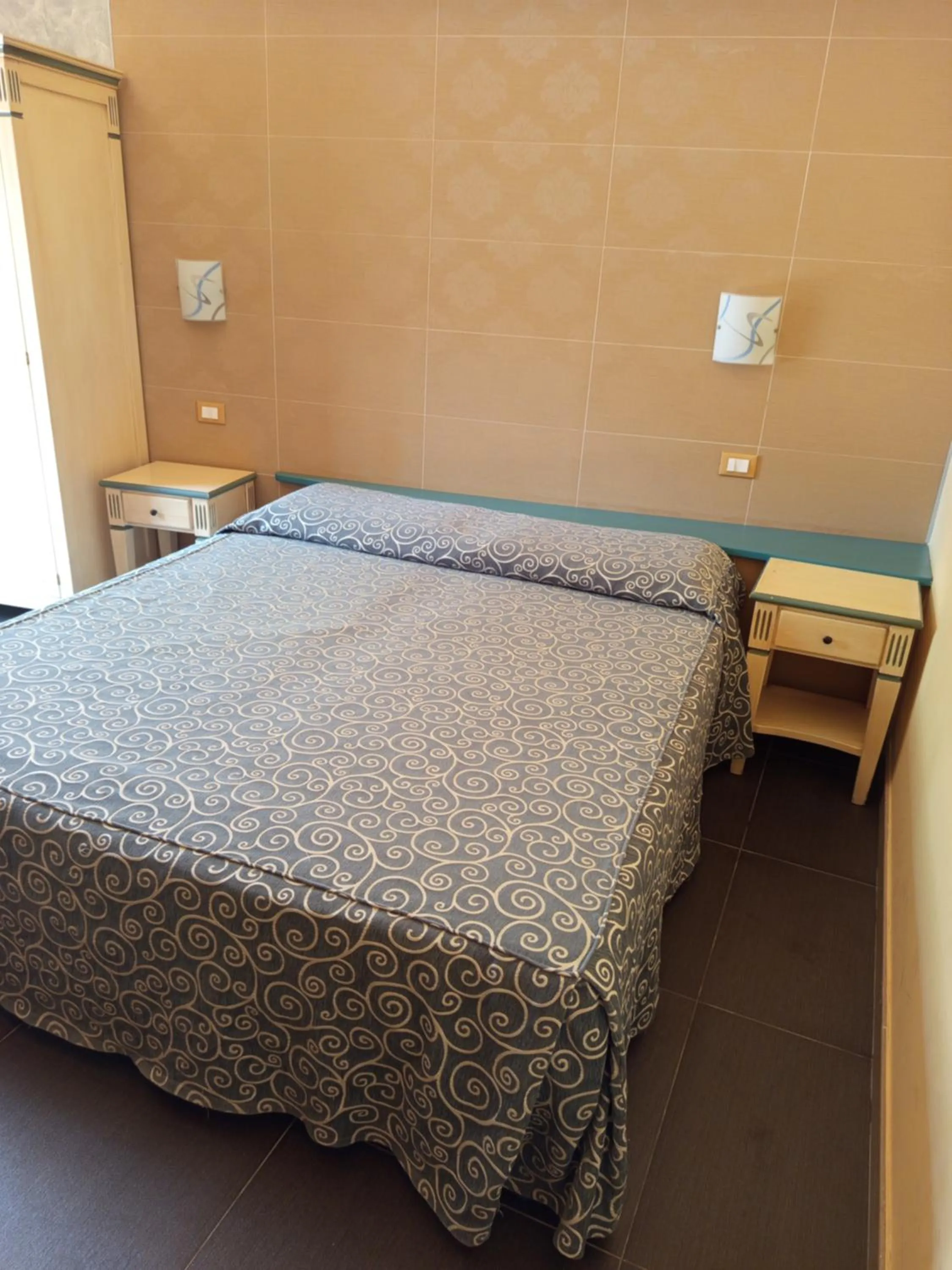 Bedroom in Amaryllis Hotel