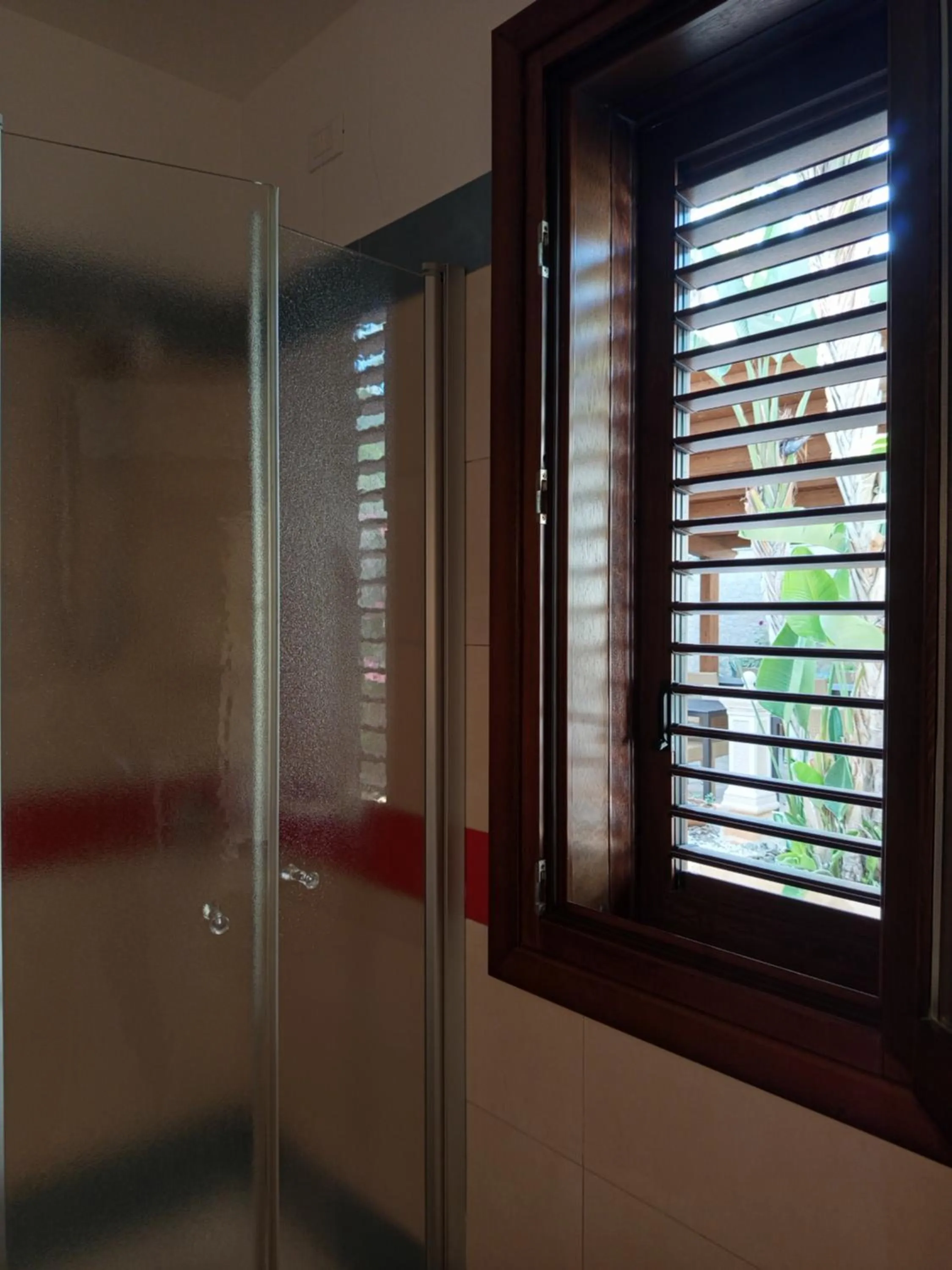Bathroom in Amaryllis Hotel