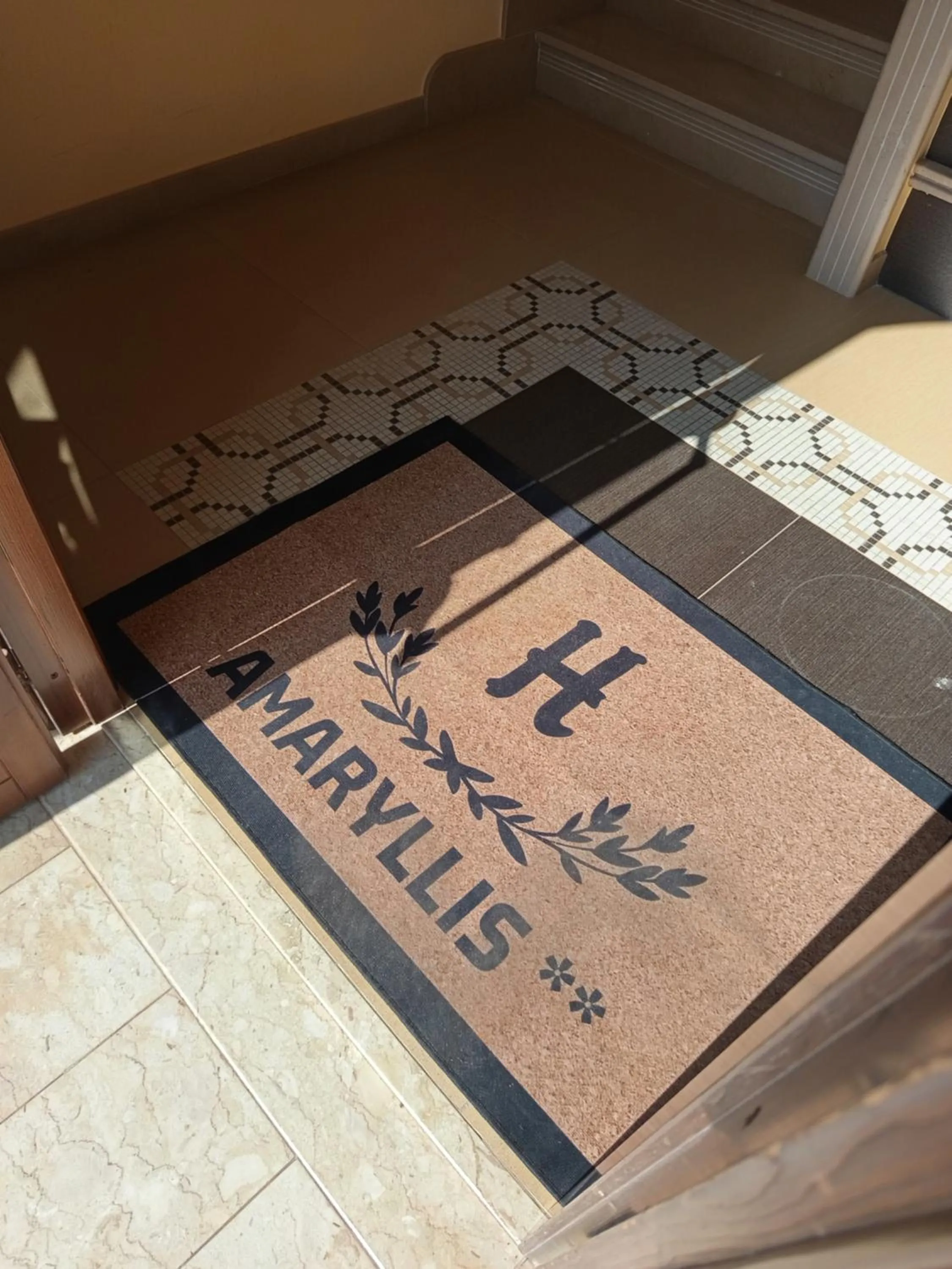 Property logo or sign in Amaryllis Hotel