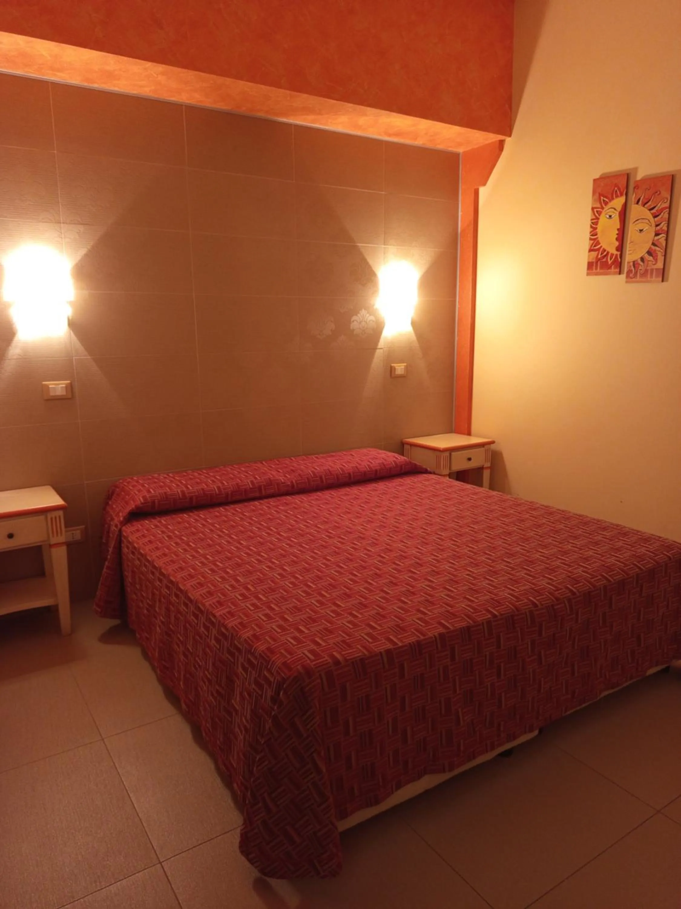 Bed in Amaryllis Hotel