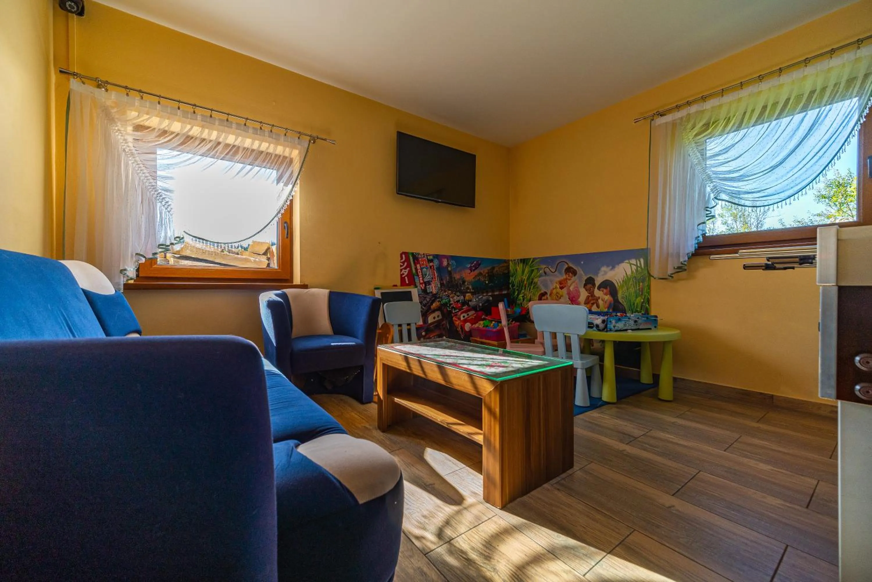 Communal lounge/ TV room in Apartamenty i Pokoje w Willi na Ubocy