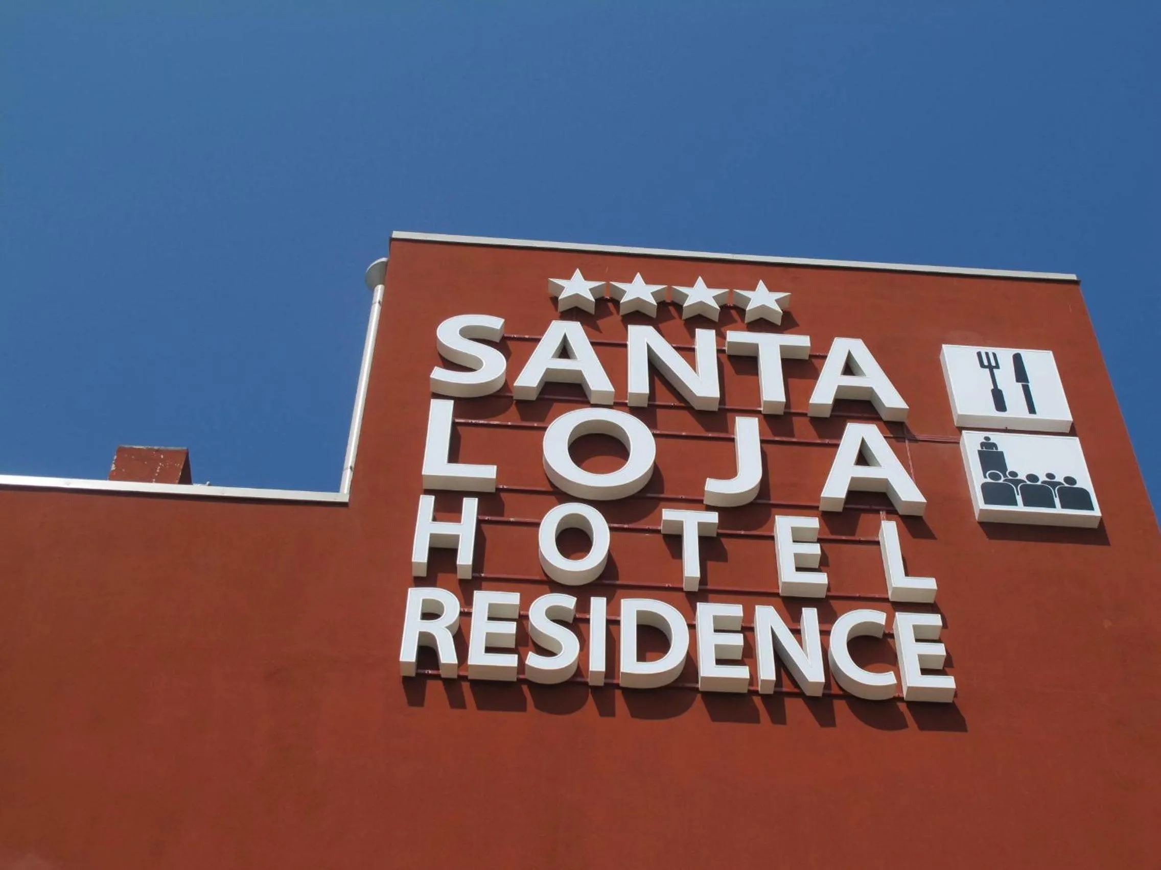 Property logo or sign in Santa Loja Hotel Residence