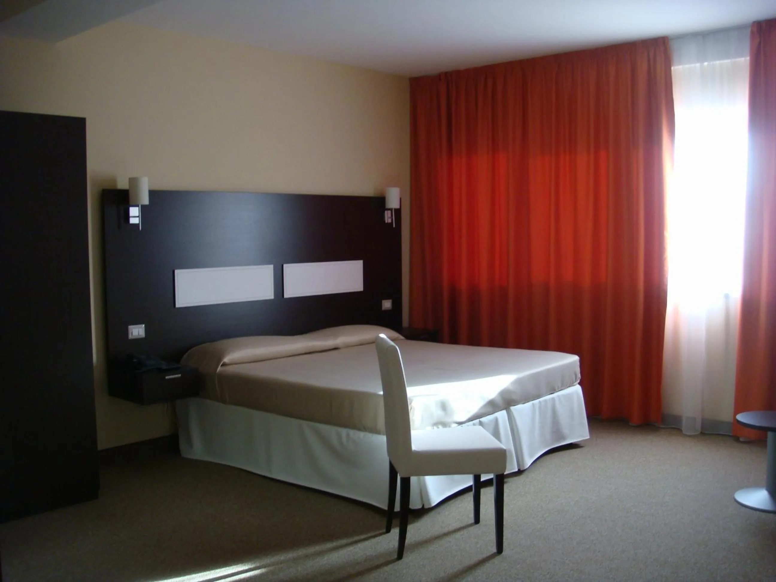 Bed in Santa Loja Hotel Residence