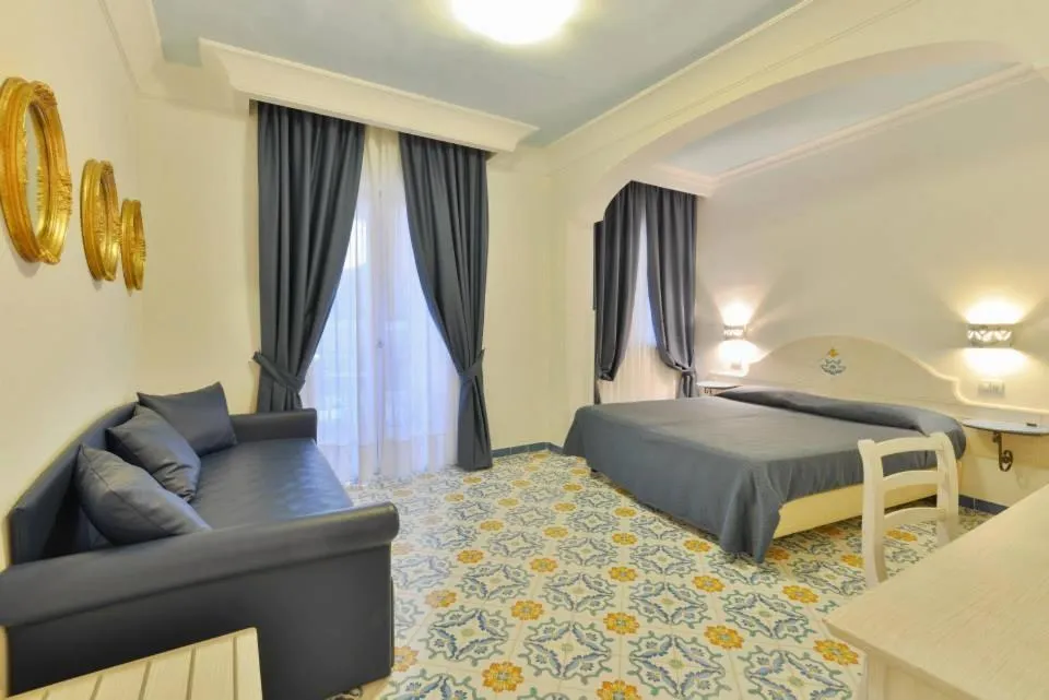 Bed in La Pineta Hotel Beach & Spa