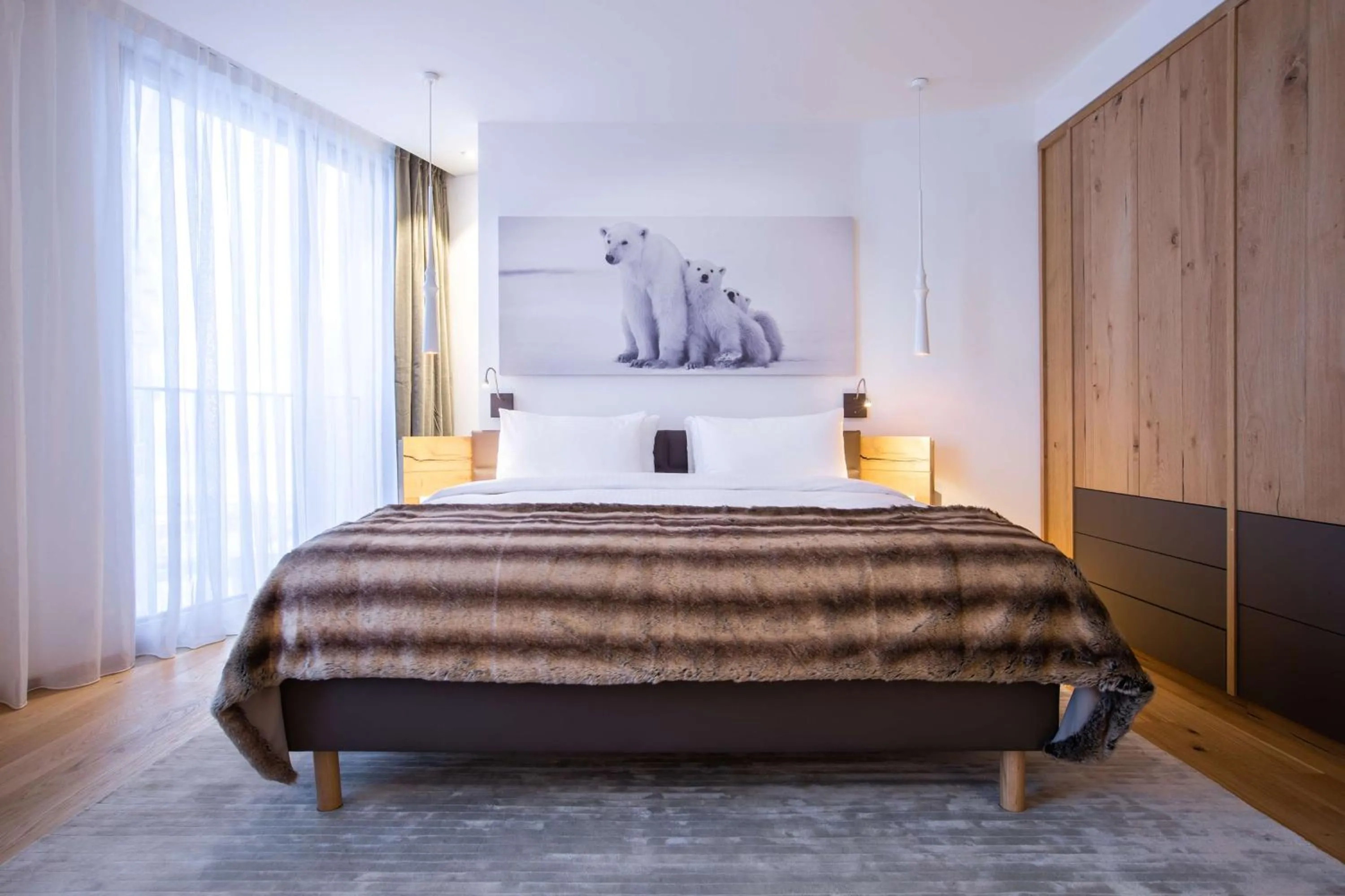 Photo of the whole room, Bed in Radisson Blu Hotel Reussen, Andermatt