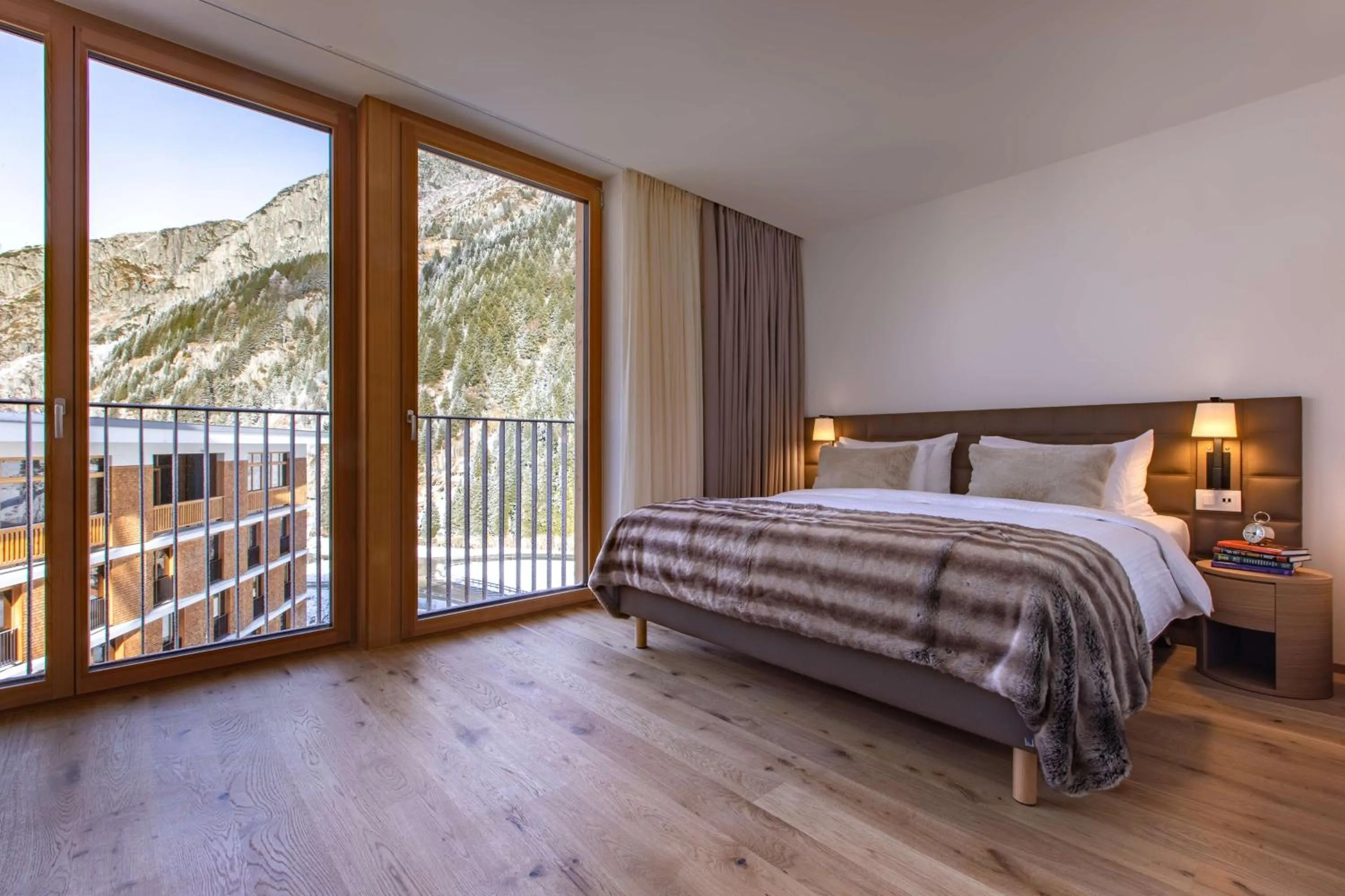 Photo of the whole room, Bed in Radisson Blu Hotel Reussen, Andermatt
