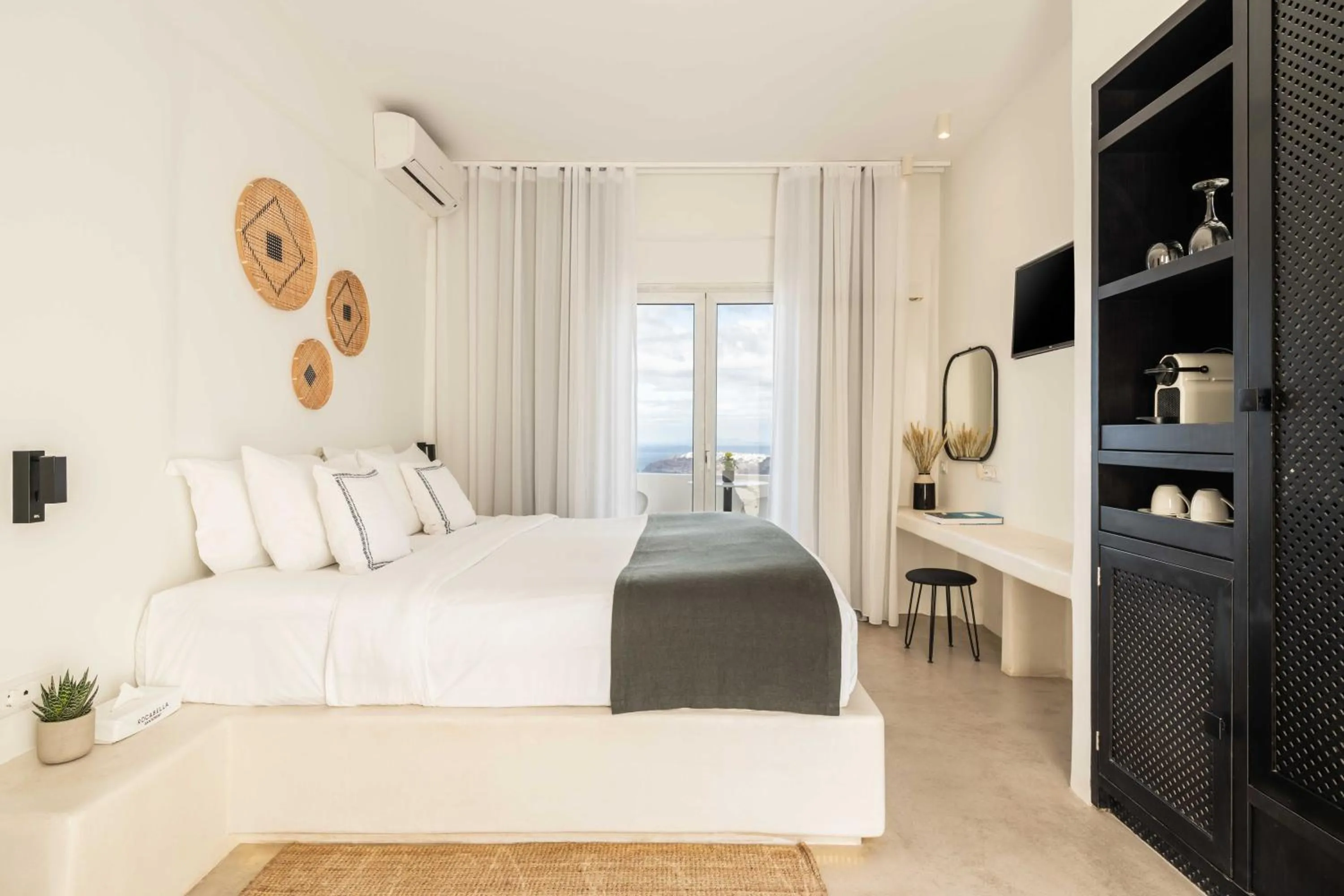 Bed in Rocabella Santorini Hotel & Spa