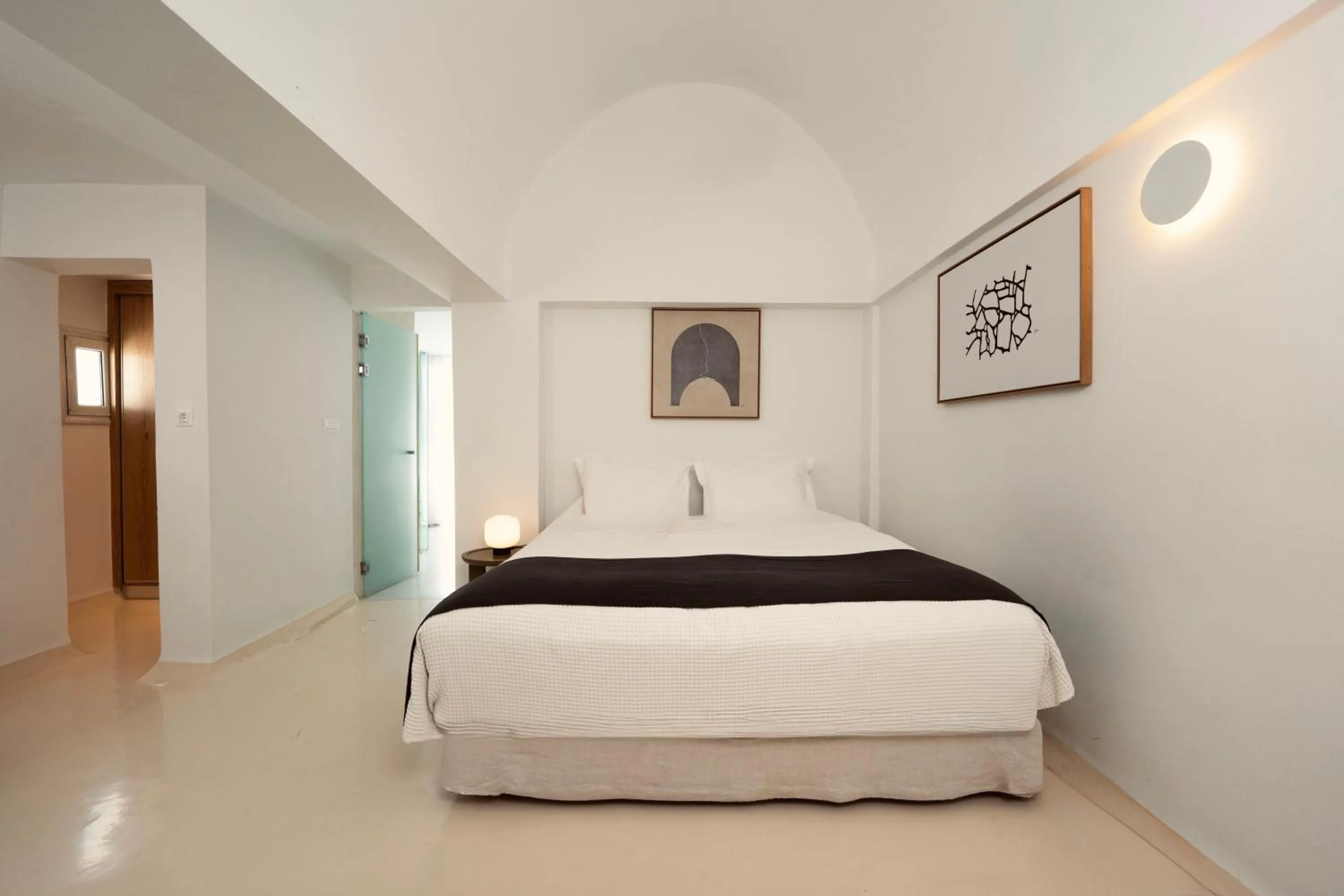 Bed in Rocabella Santorini Hotel & Spa